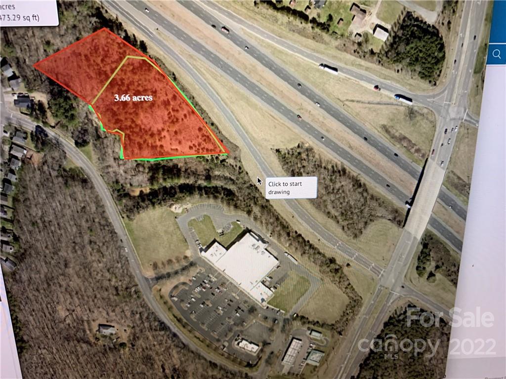 2.66 acres that front I 485 and Food Lion shopping center, combined with other parcel of 1 acre makes this an ideal office or commercial of highest best use for the area and surrounding neighborhoods.  Land is gently sloping to the south.  Call agent for any questions or listing details.  Land is land locked and does not have access.  Several new developments in area and a large apartment complex coming across the street.

NEW DEVELOPMENT ALL AROUND EXIT