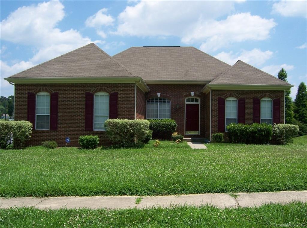 Beautiful brick-front ranch is located in a well-established neighborhood conveniently located off Mt. Holly-Huntersville Rd and minutes to Beatties Ford Rd and I-485. 3-BR, 2-bath split floor plan includes HW entry, formal DR w/chair rail molding, and large GR w/raised ceilings and fireplace. Spacious kitchen w/pantry opens to charming breakfast nook w/bay window view. Master suite features tray ceiling and private bath w/garden tub and sep shower. Situated on large corner lot w/rear deck.