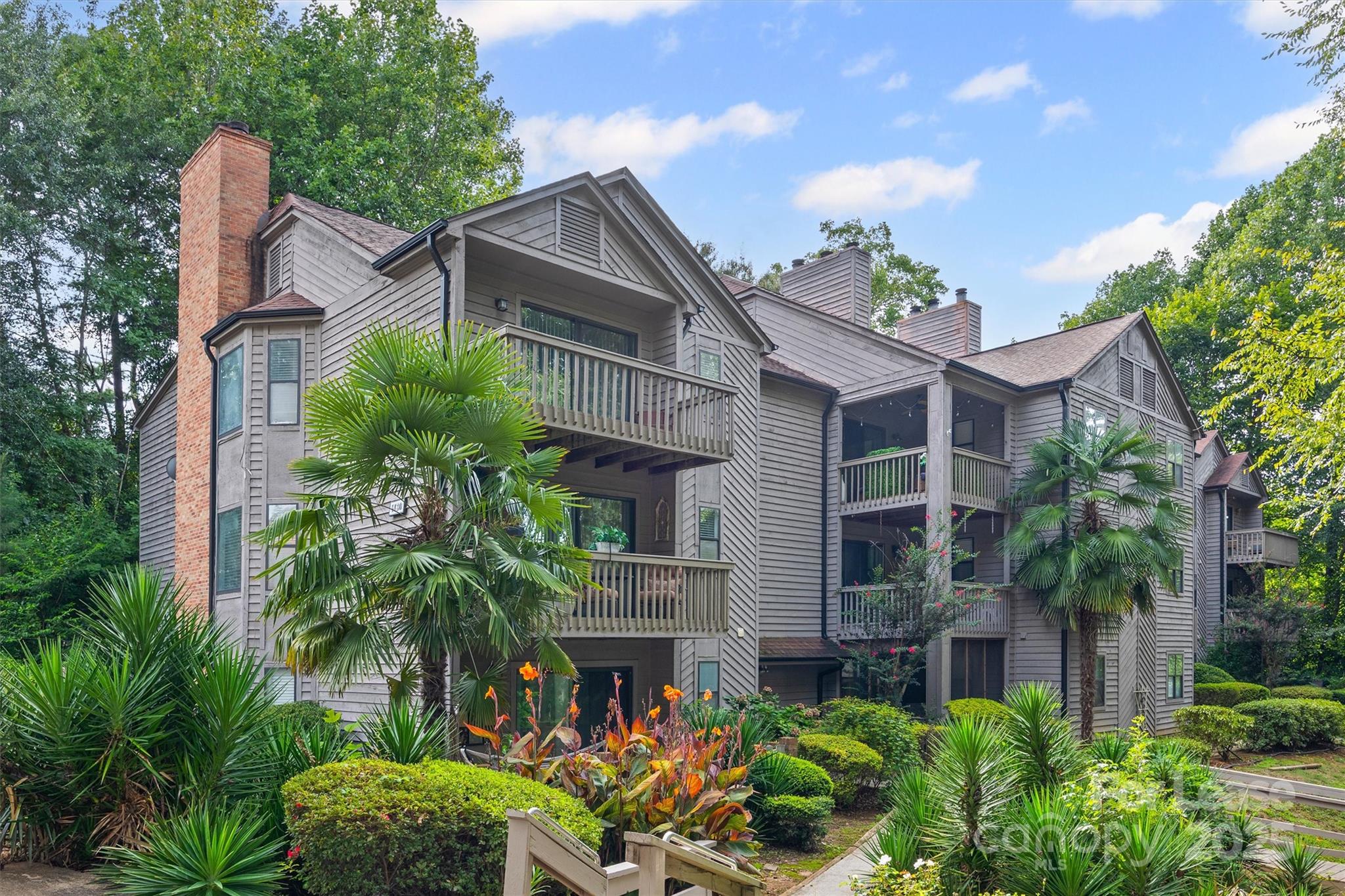 This beautifully maintained 2-bedroom, 2-bath 3rd Floor unit in Lake Wylie Woods is a Gem! Updated fixtures, LVP floors in living areas and bedrooms. The kitchen offers SS appliances, tiled backsplash, and a convenient breakfast bar. Wood-burning fireplace in the great room. Both bedrooms are en-suites and have their own outdoor spaces, excellent for a roommate situation. The primary suite features a walk-in closet, a ceiling fan, and sliding doors that lead to a deck with a storage area. The primary bath has an updated vanity & fixtures, and a Step-in shower. Bedroom #2 has a ceiling fan and sliding doors to a private covered/screened balcony. Bath #2 has updated vanity and fixtures, and a shower/tub combo. Pets conditional. One small dog only considered. **No Cats** WIFI included.