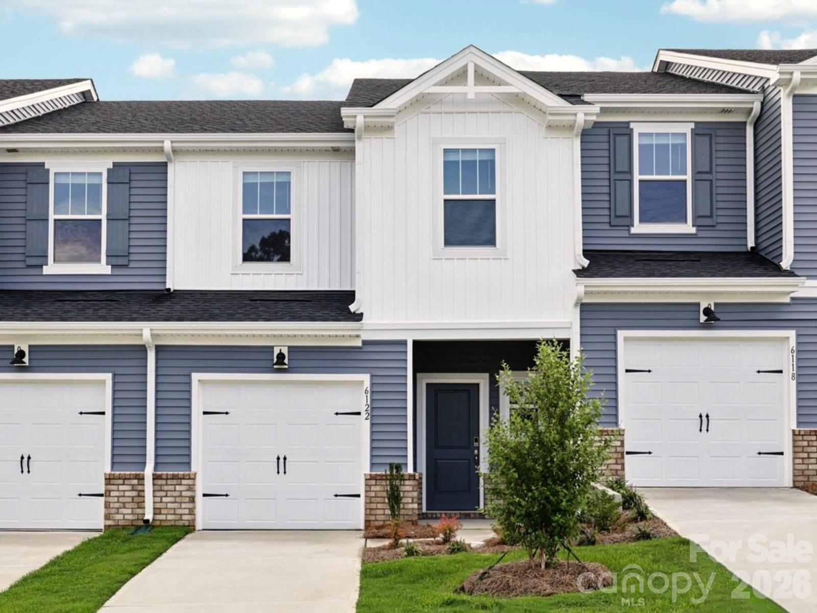 Brand new, energy-efficient home available by Aug 2026! Prep dinner at the kitchen island while mingling with guests in the open-concept great room. Upstairs, the spacious primary suite features dual sinks and a walk-in closet. A convenient second-story laundry simplifies the chore. New move-in ready townhomes in Northwest Charlotte from the $300s check every box: energy-efficient and smart-home features, equipped with a washer, dryer, fridge and whole-home blinds. Guaranteed to close in 60 days or less. Enjoy a low-maintenance lifestyle, a private resort-style pool and relaxing days in your private primary suite, all with easy access to Uptown Charlotte and Lake Norman.  Each of our homes is built with innovative, energy-efficient features designed to help you enjoy more savings, better health, real comfort and peace of mind.
