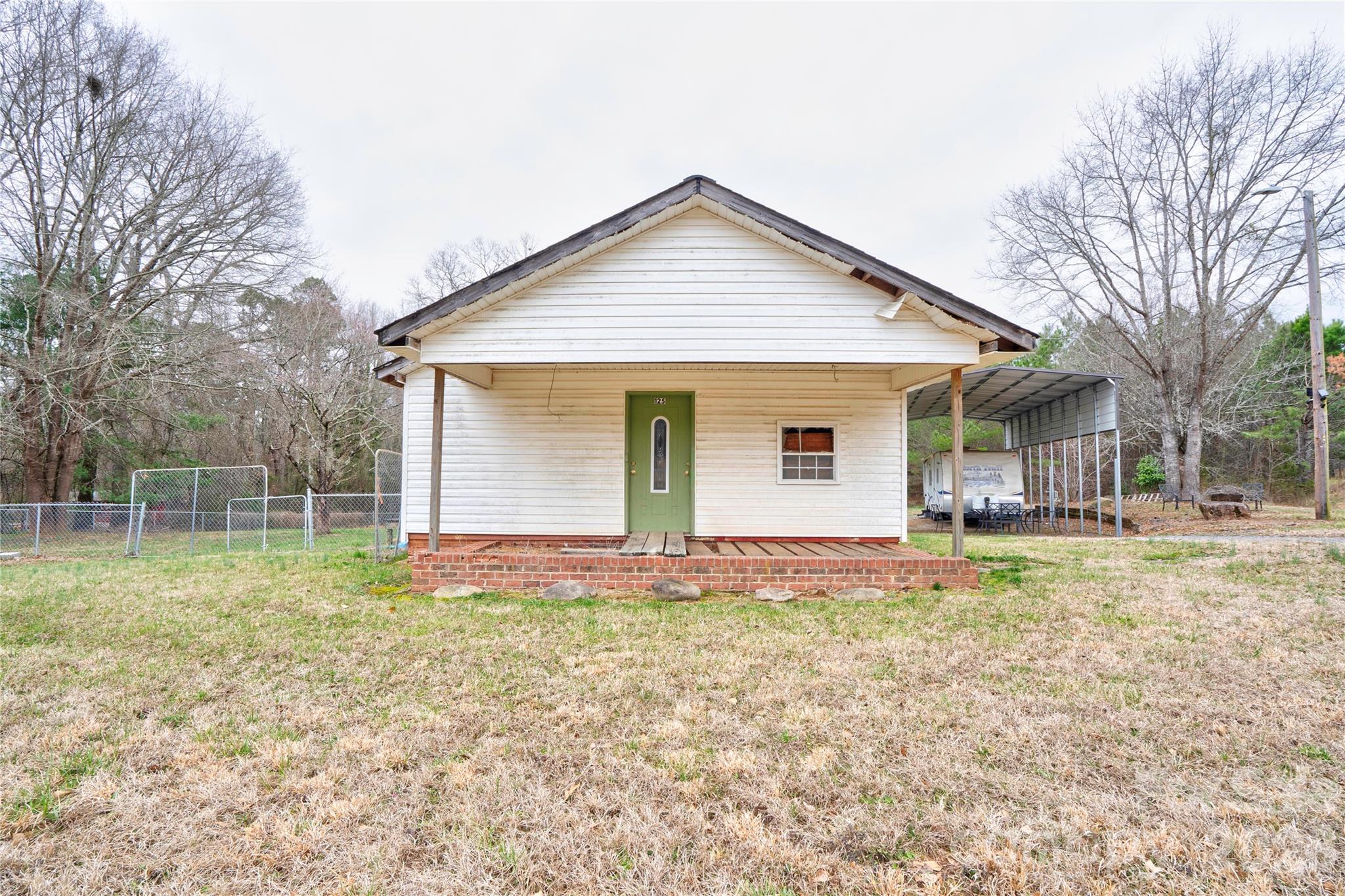 Investors Special!  Great opportunity for investors or buyers looking for a project. Remodel has been started but is not completed, giving you the chance to finish it your way. No permits were pulled and the home is being sold cash only.  Current layout offers 2 bedrooms and 2 bathrooms. Exterior features include a covered front porch, fenced rear yard, and a metal RV carport.  Bring your vision and turn this property into a great investment or future home!