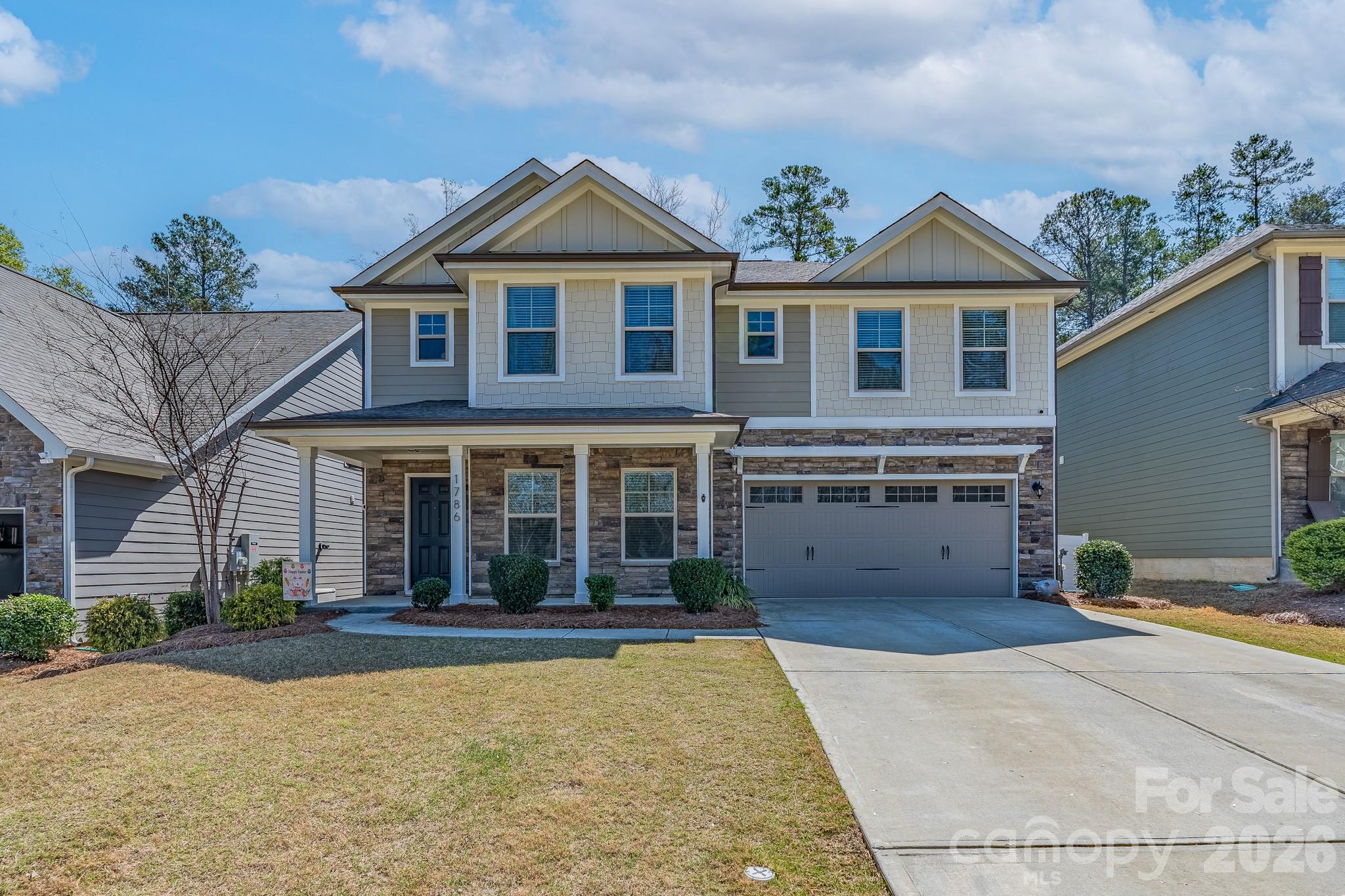 This four-bedroom, two-and-a-half bath home is ready to welcome new owners.  The main level open floor plan seamlessly integrates the living, dining, and kitchen areas, perfect for entertaining. The kitchen, with granite, stainless appliances, and island is bright and welcoming.  The dining room has versatility and can be used as a home office, if needed.  Upstairs is home to all bedrooms and a nice loft area.  There is room for owners and guests.  The primary suite boasts two walk-in closets and a spacious bathroom with a soaking tub and separate shower. Three additional bedrooms, a second bath, and laundry room complete the upstairs. Step outside to the very spacious patio and enjoy the serene surroundings in the fully fenced backyard that overlooks a wooded area. The neighborhood also features sidewalks and a community fire pit. With the HOA covering lawn maintenance, enjoy easy upkeep and stress-free living.  This could be the ONE for you!