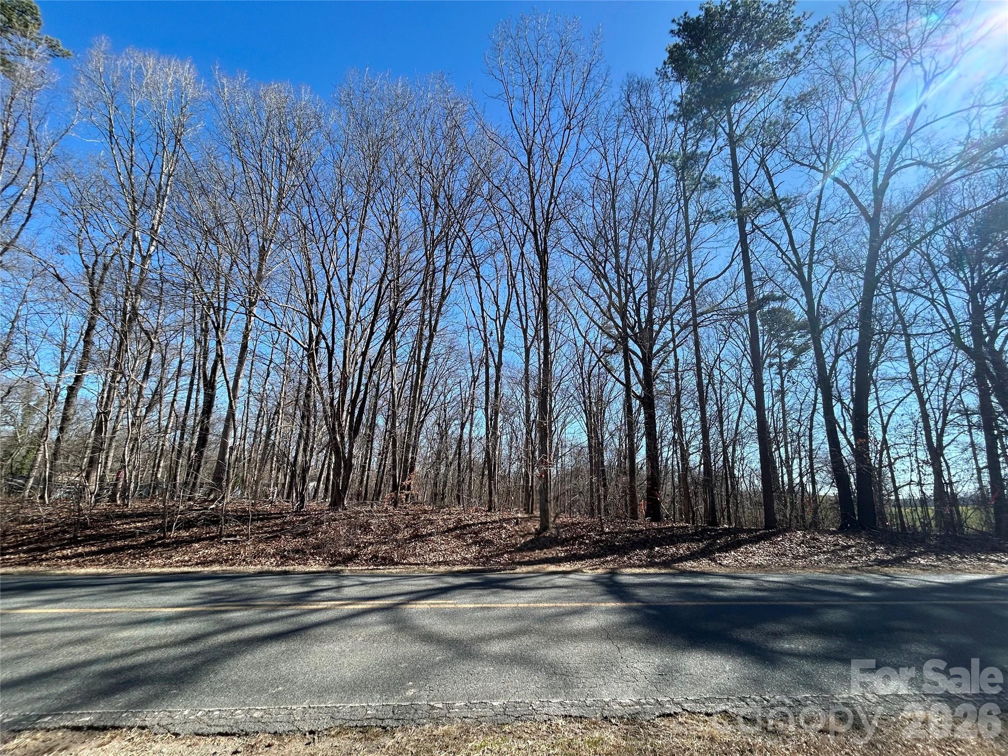 Discover this spacious .90-acre lot on Medlin Road, perfect for building your dream home. The builder already has permits in place for a well and septic system designed for a 3-bedroom home, making the process smoother for you. With no restrictions, you have the freedom to design and create the perfect living space. Located in a peaceful area of Monroe, this lot offers privacy and plenty of room to bring your vision to life. Don’t miss out on this great opportunity! (could be a basement home or have a high crawl). Reference MLS 4336655 for a to be built Home.