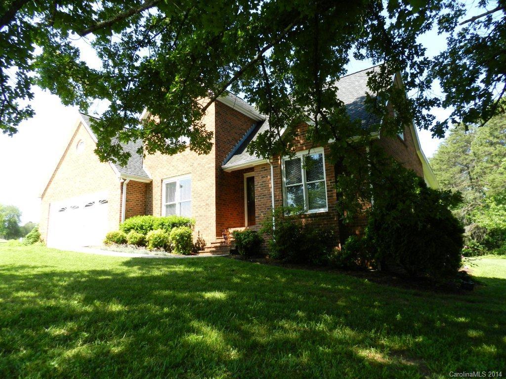 Gorgeous Golf Course Home! Remodeled main floor includes eat-in kitchen w/custom cabinets, granite counters, stainless appliances & pendant lighting. Great room w/vaulted ceilings, brick FP & leads to deck or screened porch. Main level master is all new. Bath features double under mount sinks w/granite top, new cabinets, flooring & lighting. Formal DR, entry way & laundry complete the main level. Double garage. 2nd level has 3BR, 1.5BA. Rooms offer natural light. Large attic located off hall.
