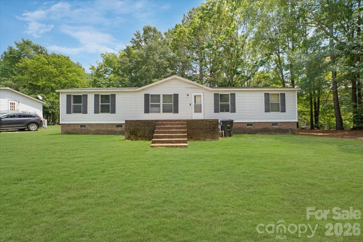 Great Opportunity for Investors or First-Time Homebuyers!

Don't miss this affordable 3-bedroom, 2-bath manufactured home situated on a permanent foundation on a spacious 0.31-acre lot in Ansonville. Nestled on a quiet street with a peaceful wooded backdrop, this property offers a large yard with plenty of room for outdoor activities, gardening, or future improvements.

Whether you're looking to expand your investment portfolio or purchase your first home, this property offers excellent potential at an attractive price. Schedule your showing today and explore the possibilities!