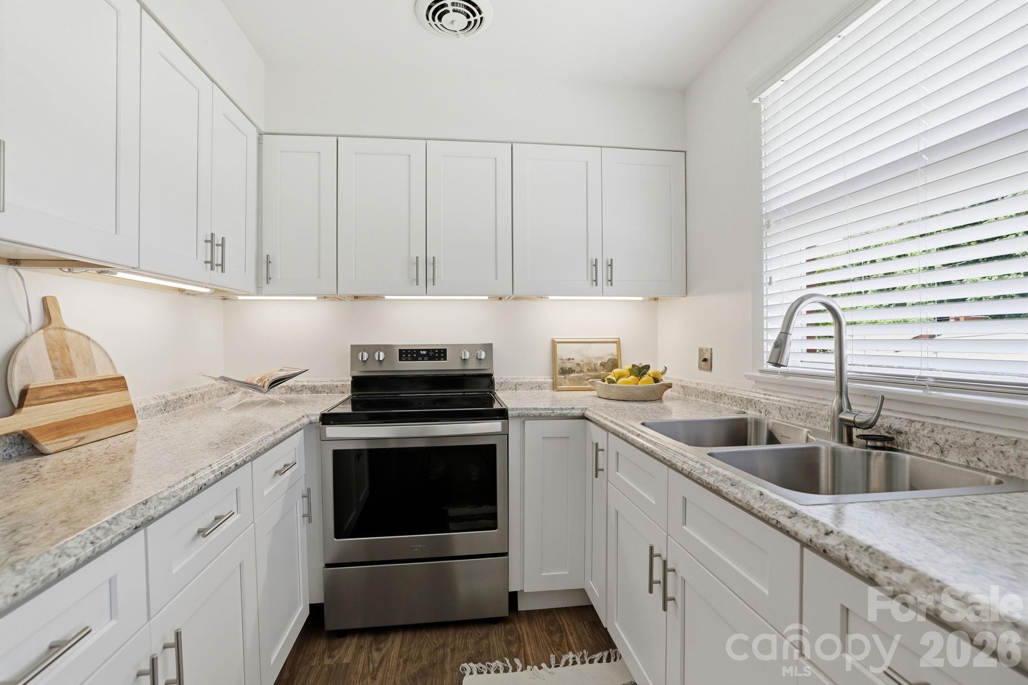 Location, location, location!! This 3BR/2BA end unit is just minutes from Cotwold Village, restautants, shopping and retail! Easy commute to Uptown! Enjoy all new interior paint on the walls, ceiling and trim, new pedastal sink in the half bath and a new elegant cabinet vanity in the full bath, new vanity lighting, new vanity mirrors, new brushed gold fixtures, new light fixtures in all BRs, hall and kitchen, plus an updated kitchen with stainless steel appliances, newer electric range, newer dishwasher, white shaker cabinets, and floating shelves. Timeless Hardwood floors throughout, stackable washer and dryer included, HVAC 2020 and Hot Water Heater 2020, secured common storage areas are located below the unit for easy access. The HOA covers all lawn maintenance, exterior building maintenance, termite bond, common areas and your water and sewer! Do not miss the only 3BR end unit that is currently available! This property is move in ready and has been well cared for!