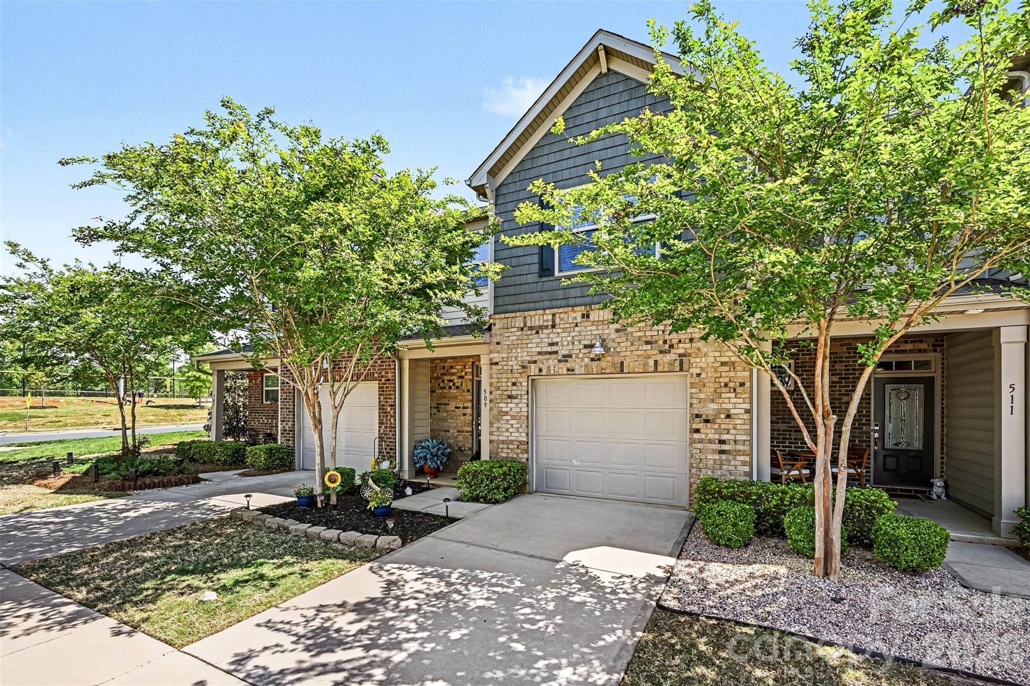 ***$5,000 Lender Credit when you get approved with participating lender*** Welcome to the townhomes at Waterside at the Catawba! ideally located just minutes from downtown Fort Mill, this home offers access to a highly sought-after school district, along with nearby shops, restaurants, entertainment, and everyday conveniences.  The community features an impressive array of amenities, including ballfields, pickle ball and tennis courts, a clubhouse, fitness center, outdoor pool, walking trails, playground, and picnic areas. This pristine home boasts excellent curb appeal with beautifully maintained landscaping. Inside, you'll find a bright and open floor plan featuring luxury vinyl plank flooring, freshly painted walls and trim, modern fixtures, and abundant natural light throughout. The kitchen is designed for both style and function, showcasing granite countertops, stainless steel appliances, a walk-in pantry, and a spacious island with bar seating that flows seamlessly into the living and dining areas. Just off the dining area, enjoy a screened and covered back patio-perfect for relaxing mornings or peaceful evenings. Upstairs, you'll find a desirable split-bedroom layout. The primary suite includes a generous sitting area, a spa-like bathroom with a garden tub and walk-in shower, and a large walk-in closet. The secondary bedroom is equally spacious and well-appointed. New carpeting and upgraded padding enhance the entire upper level. Ready to take a tour? Come experience all that Fort Mill, the neighborhood, and the home have to offer! All items are for sale and are negotiable. Ask your agent to inquire with the listing agent!