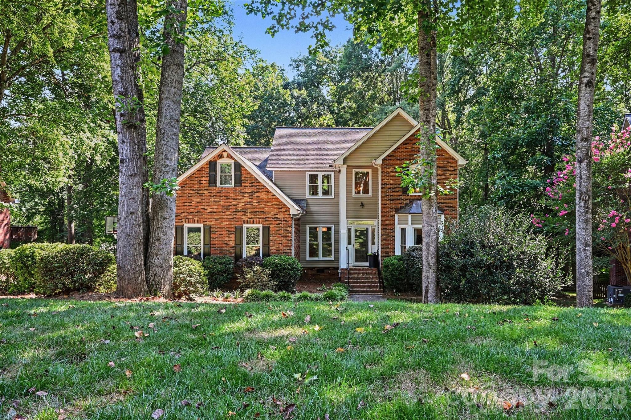 Welcome to 3532 Green Ash Lane, where timeless Cape Cod charm meets the kind of space and privacy that's getting harder to find. Tucked away in the highly desirable Willow Brook at Hunley Creek, this beautifully maintained home offers over 3,400 square feet of flexible living space designed for the way people actually live.

Step inside to an inviting floor plan with spacious living areas that make it easy to gather with family or entertain friends. The masonry fireplace creates the perfect spot to unwind on a cool evening, while the finished basement offers endless possibilities. Whether you need a media room, game room, home gym, office, or all of the above, you'll have the space to make it your own.

One of my favorite features is the three-season sunroom. Complete with its own mini split system, it's the perfect place to enjoy your morning coffee, watch the game, read a book, or simply take in the private backyard comfortably through much of the year.

Major updates provide peace of mind, including the heating and cooling systems updated in 2024 and 2025. A two-car garage and generous driveway provide plenty of parking for family and guests.

Outside is where this home really shines. Sitting on nearly half an acre, the private wooded backyard feels like your own retreat. Enjoy evenings on the shaded patio, host summer cookouts, or simply relax and enjoy the peaceful surroundings. Mature trees provide a level of privacy that's becoming increasingly hard to find. Even better, you can step right out your back door and walk directly to the neighborhood amenities, including the community pool, tennis courts, and playground. It's the perfect setup for families and anyone who enjoys an active lifestyle without ever getting in the car.

All of this is tucked away on a quiet street while still being just minutes from everything Matthews has to offer. Enjoy easy access to charming downtown Matthews, shopping, restaurants, I-485, and Highway 74, making commuting around Charlotte simple and convenient.

If you've been looking for a home with character, flexible living space, a backyard that feels like an escape, and neighborhood amenities just steps away, you'll want to see this one in person.