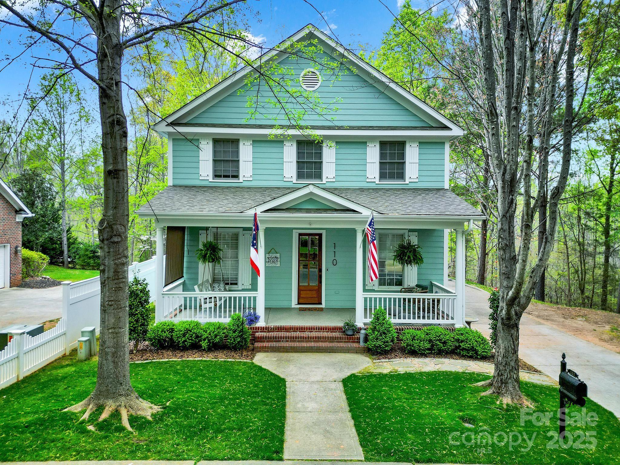 This charming two-story home features fresh exterior paint, a new wood front door, and new porch flooring. Inside, you'll find refinished floors, tread stairs with plush carpeting. The office boasts sliding doors and built-in cabinets, while the newly updated powder room offers stylish tile and finishes. The kitchen highlights a stone island that complements the fireplace, along with custom woodwork and coat hooks in the back hall. Modern light fixtures enhance the home's sleek aesthetic. Upstairs, the full bathroom has been completely renovated with a new counter, tile floor, and a walk-in shower. The serene primary bedroom backs to a wooded backyard, with a beautifully upgraded en suite, featuring a standalone soaking tub, new fixtures, a tiled shower, and a spacious walk-in closet. The laundry room offers new tile flooring and custom wooden shelving. Enjoy ultimate privacy as the home backs to the community's wooded trail system and is located at the end of a quiet cul-de-sac.