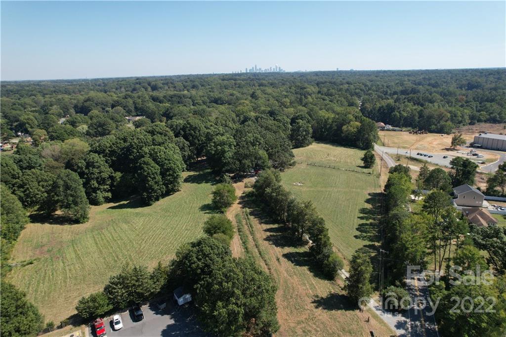 Great location, minutes from I-85, I-485 and Charlotte Douglas International.  Development Opportunities abounds!  Ideal for Single Family or Multi Family. Copy link below for aerial tour of property.