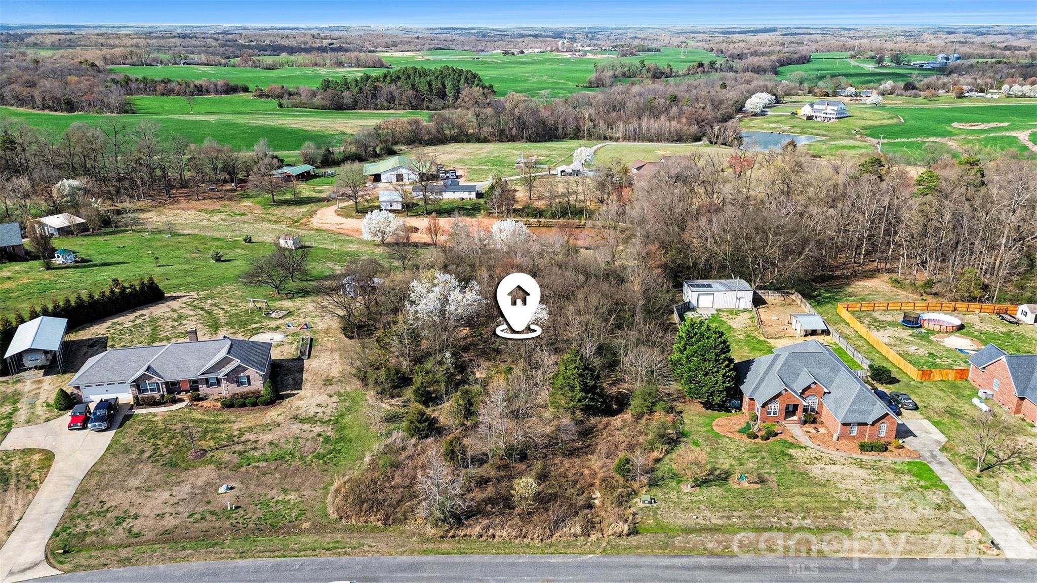 Dreaming of building your perfect home? Look no further! Welcome to Waverly Place—an established all-brick community nestled in the peaceful countryside of Monroe, NC. This nearly one-acre homesite offers the perfect setting to create your custom brick home surrounded by beautiful established residences and spacious lots. The perc test and survey have already been completed, helping streamline the building process and get you closer to breaking ground. The site has been perked for a 3-bedroom drip dispersal system with potential for 4 bedrooms depending on the home plan and county approval. CC&Rs require brick veneer exteriors, preserving the timeless character and quality of the neighborhood. Enjoy the charm of country living with room to spread out, while still being conveniently located to Monroe, Waxhaw, and the Monroe Bypass for easy access to Charlotte.