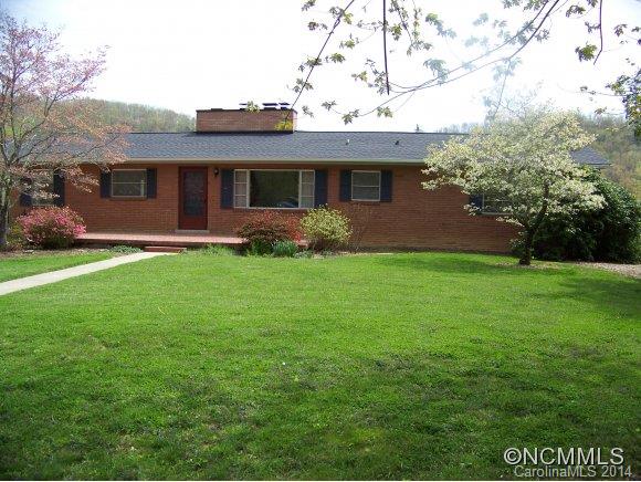 Amazing 4BR south facing brick home in a beautiful country setting with pastoral and mtn. views. 3 great fireplaces, hardwood floors, 2 patios, and lots of storage. Neat mother-in-law apartment with separate entrance. Detached workshop/barn with walk up attic and basement. All on 4.4 acres so bring your horse. Listing agent part owner. Children's play area and hiking trail close by.  Realtor/Agent is part owner.