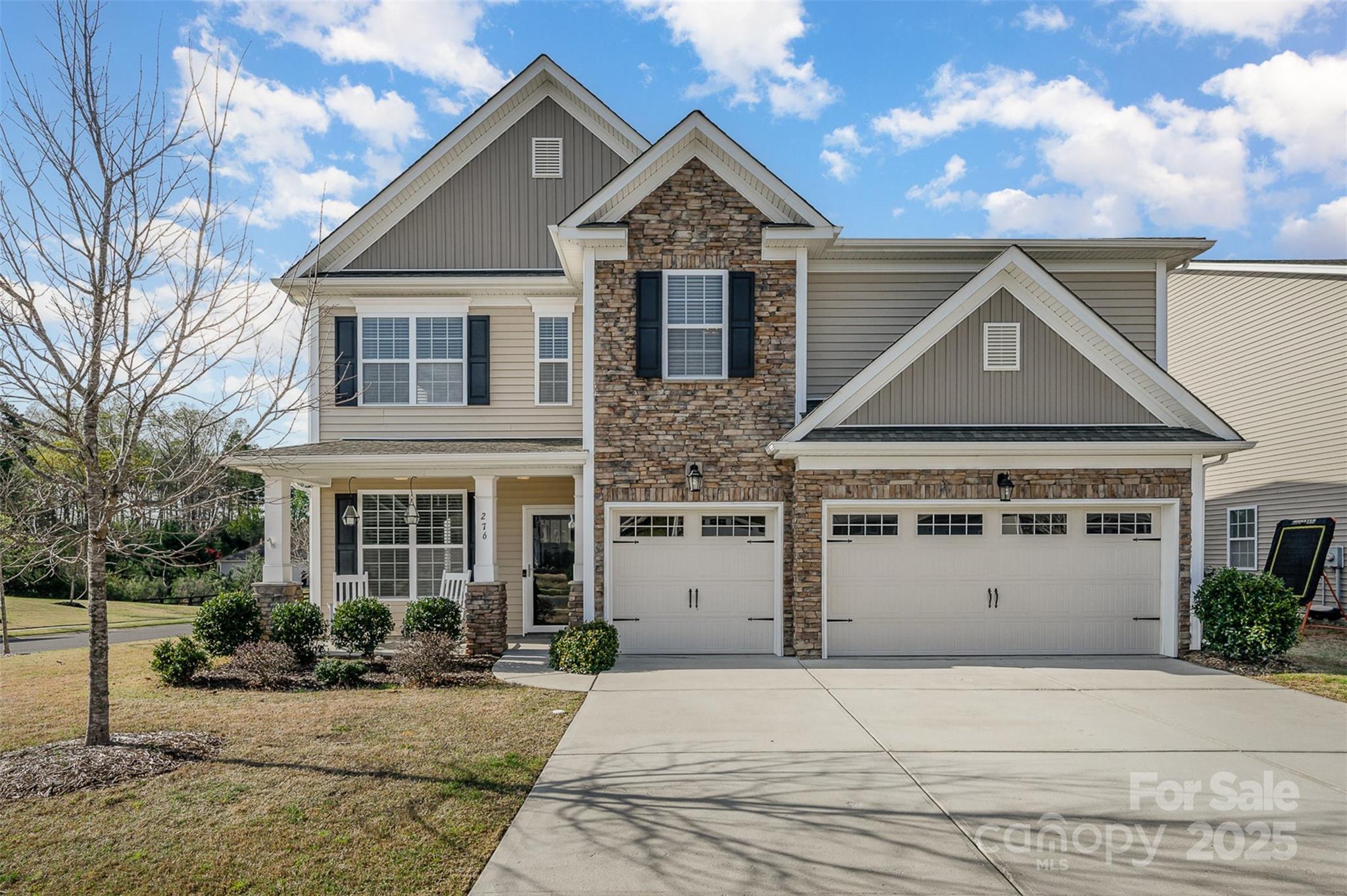Stunning home in the Lake Ridge community of Tega Cay! This move-in ready home features a 3-car garage, spacious 1/4 acre lot, newly added 18' x 12' gable roof screened porch, & a fenced backyard w/ privacy trees. Privacy trees are expected to grow 10-15 ft for a private backyard oasis! Inside, enjoy pre-finished hardwood floors, crown molding, & a spacious open floor plan. The chef’s kitchen boasts granite countertops, double ovens, & a gas cooktop. A main-floor bedroom w/ half bath can easily be converted to a full bath!  The primary suite offers a new custom wardrobe area, dual vanity sinks, a tiled walk-in shower, & a soaker tub. Enjoy spacious bedrooms & large bonus room for movie room, play room or extra living space! Located between a culd-de-sac & walking trail entrance! Enjoy top rated schools + amenities including walking trails, pool, sport courts, & more. Located near Catawba Park &  2 miles from Nivens Creek Landing boat launch, it's a perfect spot for outdoor enthusiasts!