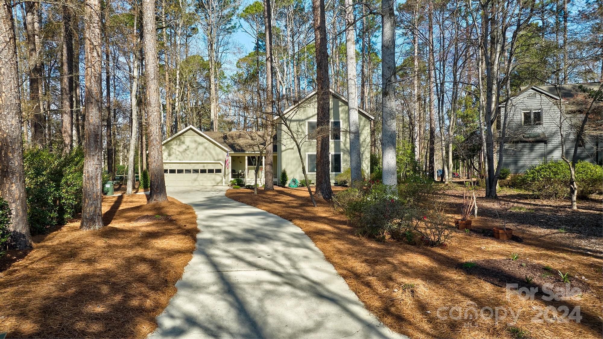 Wonderful updated and renovated home on large lot! Home is in gated golf course and waterfront community of River Hills. This home offers 3 bedrooms - primary on the main floor- 2 full baths, open floorplan with soaring ceilings with wood beams and tons of windows!! LVP wood floors throughout entire home! Upstairs has 2 good size bedrooms and full bath AND walk in attic storage. The kitchen has a work place island, granite counters and stainless appliances. Cosy eat in area with bay window. Garage is plenty big for parking 2 cars and still have storage. Great flow on the first floor for entertaining. Large deck on the back overlooking the large yard. Can easily be fenced in for your furry friends or kiddos! Neighborhood offers miles of walking trails, waterfront park with sandy beach and pavilion, marina, country club with 2 pools,18 hole course, tennis and pickle ball courts and amazing dining rooms,playgrounds,gardens,dog park and of course the 24/7 gated security.What's not to love!