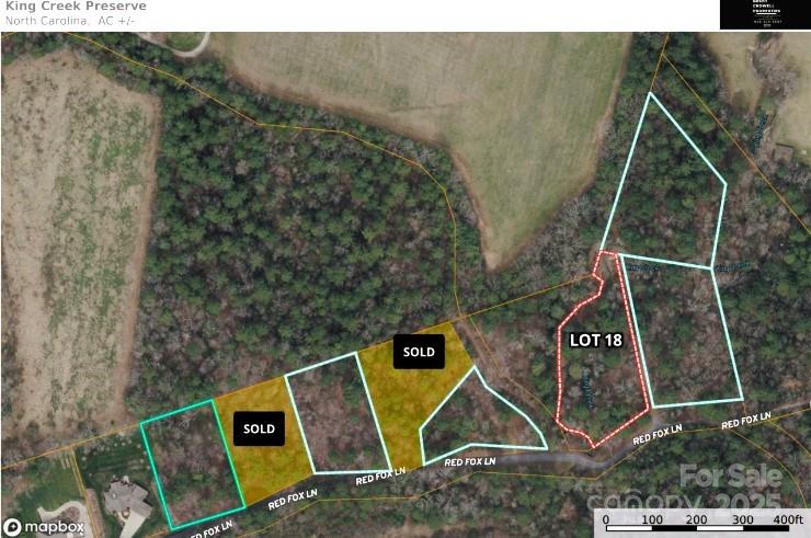 Beautiful flat wooded lot in desirable Flat Rock, bordered on two sides by large, privately held, undeveloped tracts for added privacy and a serene natural setting. This peaceful homesite offers the perfect blend of seclusion and convenience with city water, private sewer, and natural gas already available. The level terrain makes for easy building, surrounded by mature trees and quiet surroundings. Just minutes from shopping, dining, and all that Flat Rock has to offer. A rare opportunity to build your dream home in a tranquil, well-located setting.  Portions of this lot flooded during Helene.  A variance from Flat Rock could  reduce the front setback and move the build site on to a higher portion of the lot.