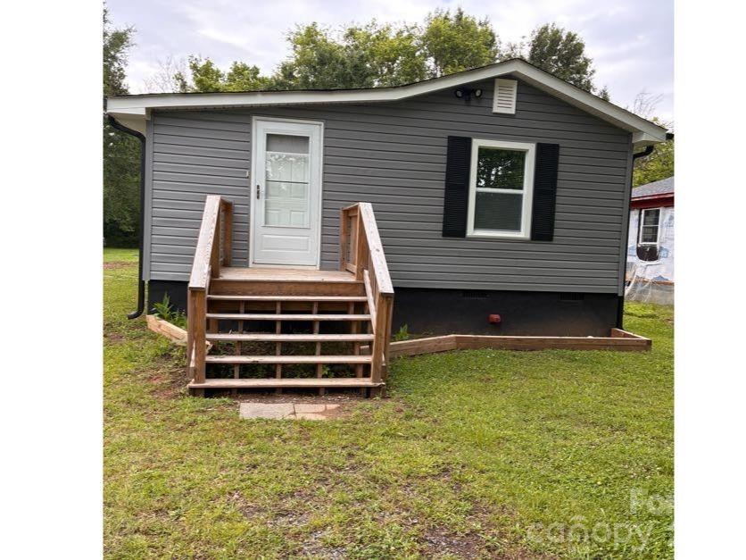 GREAT STARTER HOME OR INVESTMENT HOME! This quaint 2 bedroom, 2 bath home has been totally remodeled Inside and Out! This includes Fresh Paint throughout! NEW: LVP flooring, Carpet, Windows, Hot Water Heater, Roof & Gutters! Both Bathrooms Remodeled as well. New Deck Front & Side. Home is located in Clinton Park, a well established, quiet neighborhood. Very Spacious Kitchen and Dining area. Home Priced to Sell!