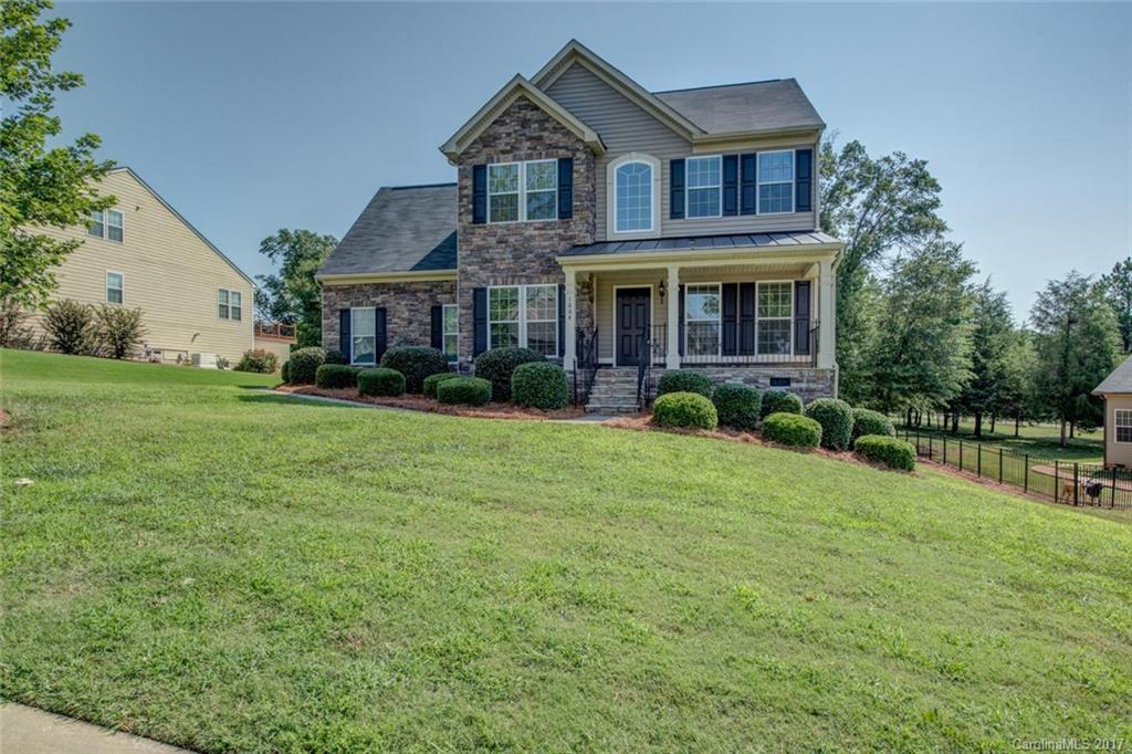 Remarkable details throughout this stunning home in the waterfront Lakepoint neighborhood. Outside, owners can unwind on nice backyard deck or access water front from the gated boat launch, docks, picnic tables and fire pit for family gatherings.  Inside of home is like new and family can enjoy a relaxed lifestyle with open den, kitchen, sunroom and informal breakfast area with high ceilings. Granite counter tops, stainless appliances, hard wood floors, gas cooktop and fireplace logs and more.