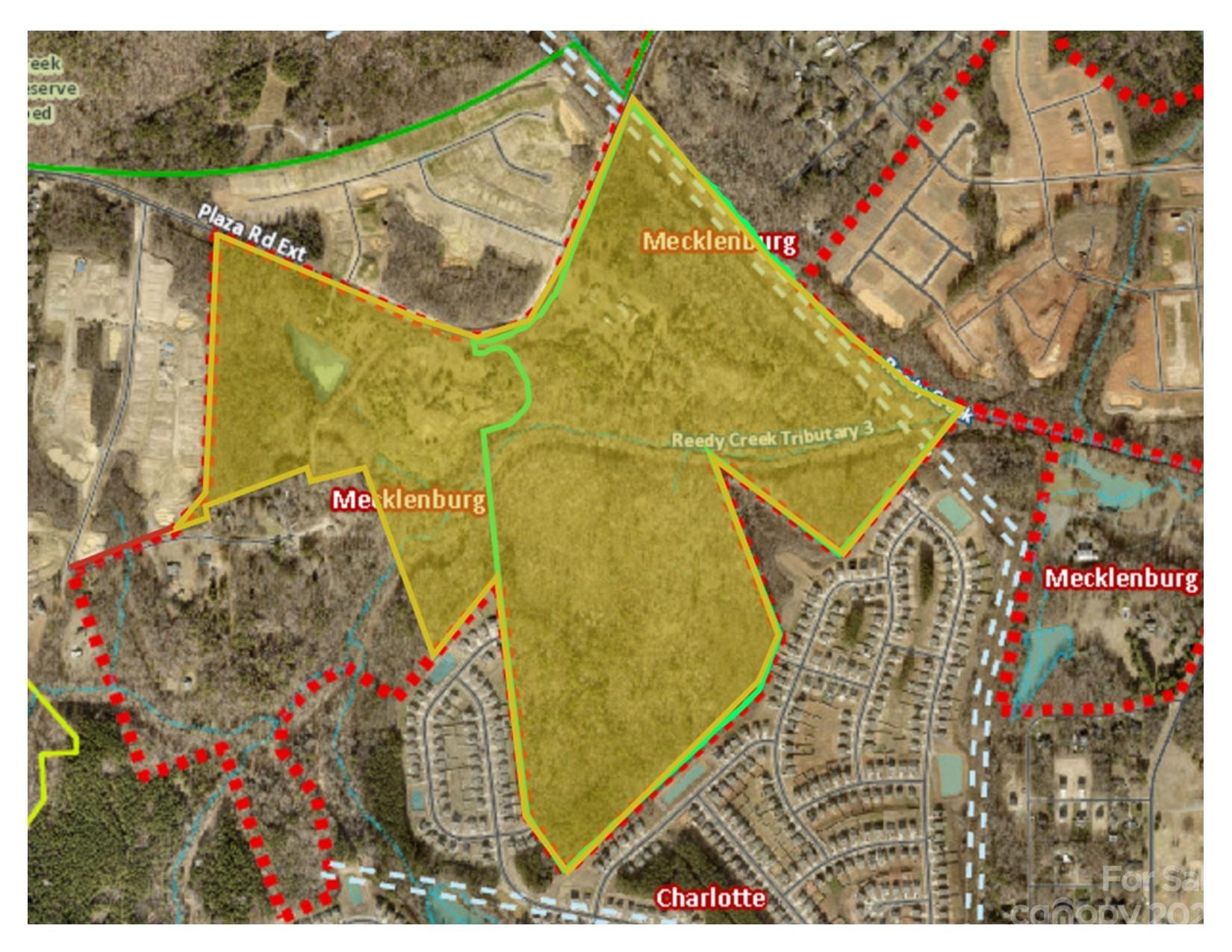 The Catawba Lands Conservancy proudly presents a piece of paradise east of Uptown, nestled between 485 & University City. Adjacent to the Reedy Creek Nature Preserve, this rare offering presents ~20 acres for residential development plus ~148 acres of Mother Nature's personal playground, featuring creeks, wildlife, trails and pure beauty all in your backyard. This is an incredible opportunity to have the best of both worlds: the developable land could become your private estate or a conservation-focused residential development, while the larger portion could be your private sanctuary, subject to a Conservation Easement with possible uses as passive recreation, trails, hunting and fishing, equestrian & agricultural activities, timber management, and education, subject to N1-A zoning. Property includes a cell tower with a long-term lease, a closed LCID landfill, some uninhabitable structures, and power & sewer easements. Listing agents must accompany all showings; no trespassing.