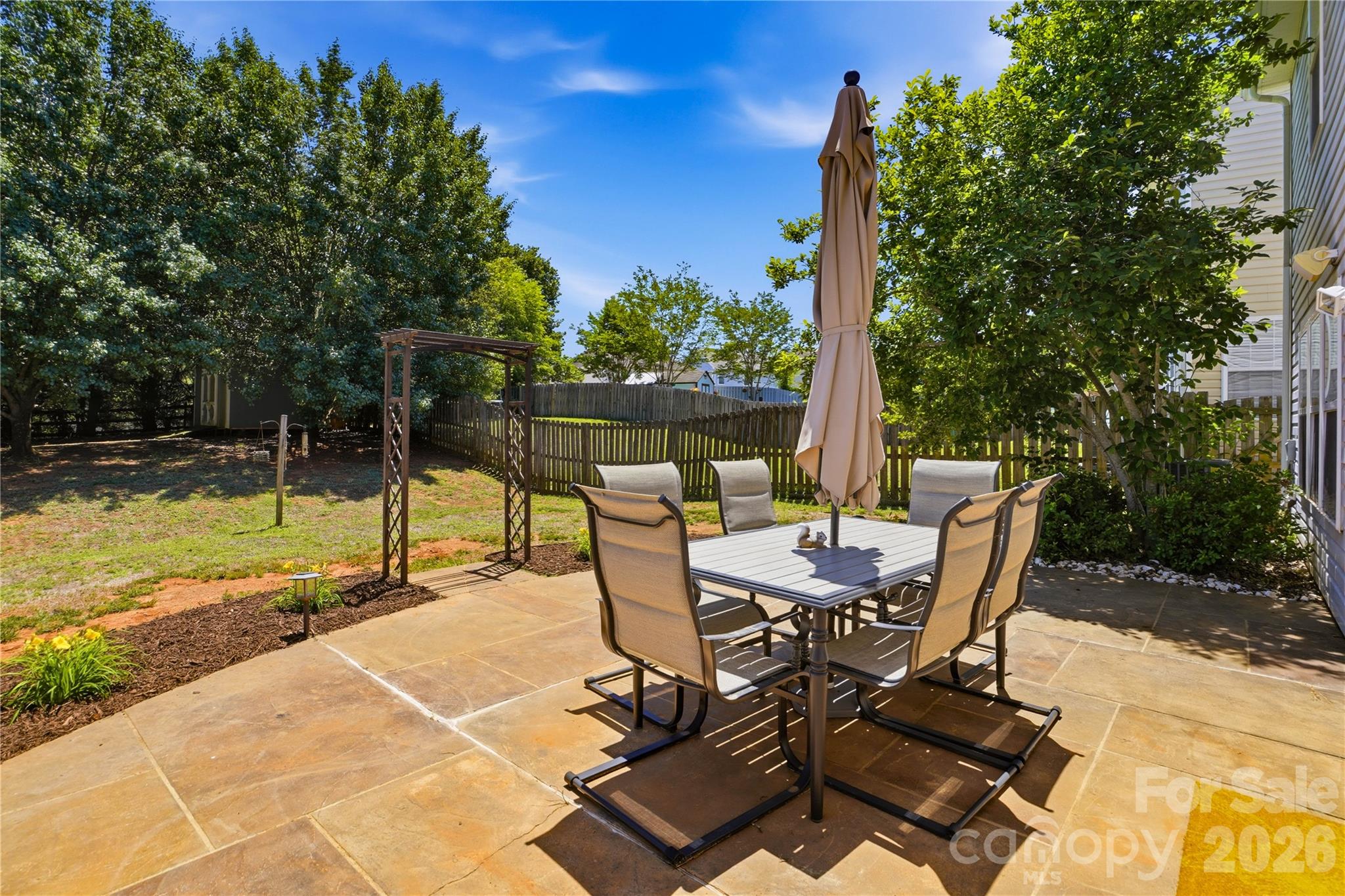Welcome home to this beautifully maintained 4-bedroom, 2,600+ sq. ft. home in the desirable Hamilton Lakes community! Designed with both everyday living and entertaining in mind, the open-concept floor plan offers spacious living areas filled with natural light and plenty of room for entertaining. 
Upstairs, you'll find a generously sized primary suite along with three additional bedrooms, providing flexibility for guest rooms, a home office, playroom, or fitness space.
Step outside into your private, fully fenced backyard featuring a large stamped concrete patio—perfect for summer barbecues, morning coffee, or relaxing evenings. A separate storage building provides ample space for lawn equipment, tools, and seasonal items. The home also features fresh paint in the bedrooms and updated landscaping, adding to its clean, move-in-ready appeal.
Enjoy peace of mind with major updates already completed, including a new roof (2024), a new high-efficiency furnace with transferable warranty (2025), a water heater (2021), and professionally serviced HVAC.
Hamilton Lakes residents enjoy a neighborhood pool, low HOA dues, and a prime location just minutes from RiverGate shopping and dining, Fort Mill, Charlotte Douglas International Airport, I-485, and I-77—making commuting throughout the Charlotte area simple and convenient.
Offering the perfect combination of space, thoughtful updates, outdoor living, and an unbeatable location, this move-in-ready home is an exceptional value you won’t want to miss!