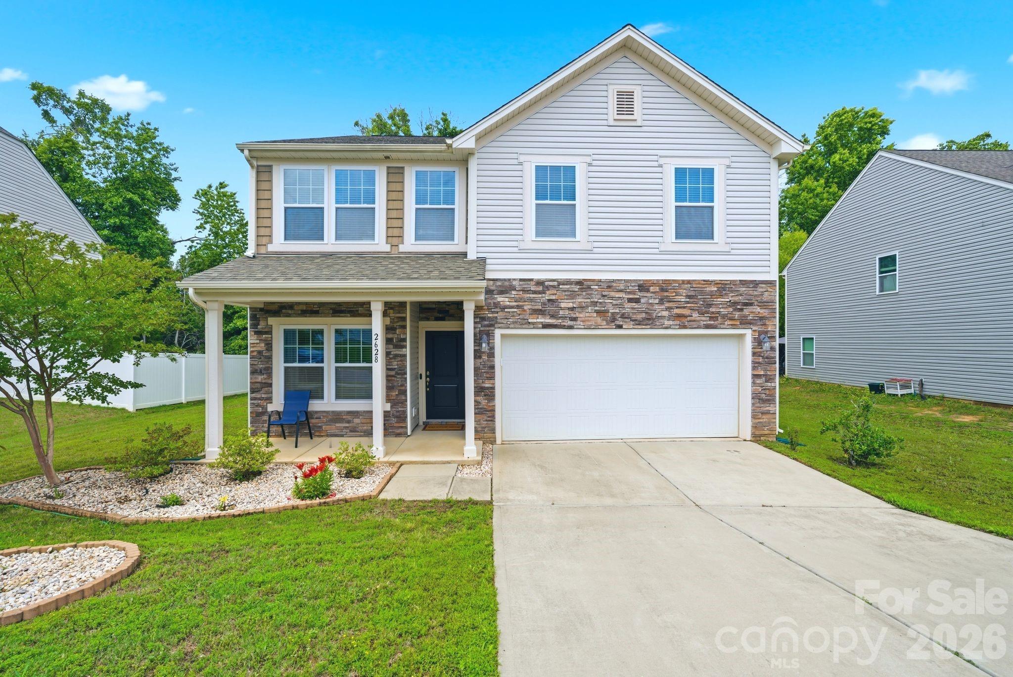 Welcome to 2628 Courtland Drive! This move in ready, 3 bedroom, 2.5 bath home is situated in the sought-after Oaks at Clover Community.  This home boasts over 2,400 square feet featuring an open main level with a Corner Office, Dining Area, Living Room, Breakfast Area, Kitchen with Granite Countertops and Stainless Appliances, a Large Pantry and a Half/Guest Bathroom.  The second level offers a Large Loft/Media/Rec Room, a Spacious Primary Suite with its own hallway leading to the Owners Walk in closet and Primary Bathroom with Dual Vanities.  This home also offers two large Secondary Bedrooms, a Laundry Room and a Utility room that provides extra storage. This beautifully maintained home has a two-car attached garage and a welcoming, covered Front Porch.  Other benefits include award-winning Clover schools, a neighborhood playground and low SC taxes.  Convenient to Lake Wylie and just a short drive to Charlotte, this home provides quick access to both lake activities as well as city amenities. Schedule your tour today!  Buyers Agents Welcome!