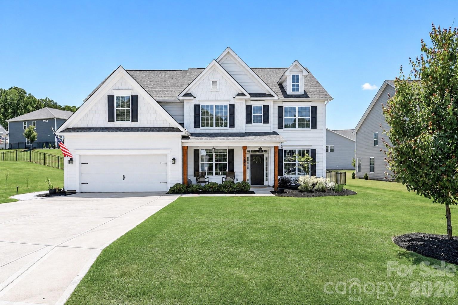 Don’t miss this exceptional opportunity to own this beautifully upgraded smart home featuring 5 bedrooms, 4 full baths, and custom finishes throughout. Thoughtfully designed for both luxury and everyday living, this home offers outstanding indoor and outdoor spaces buyers will love. The welcoming foyer opens to an elegant dining room with coffered ceiling and private study before leading into the expansive great room highlighted by a stunning vent-free dry stack stone gas fireplace with hearth and custom built-ins. Smart blinds in the great room, Wi-Fi switches, and upgraded lighting add modern convenience throughout. The chef-inspired kitchen features quartz countertops, an island overlooking the great room, updated stainless steel appliances, including the refrigerator which conveys with the home, gas cooktop, double wall ovens, walk-in pantry with upgraded shelving, and a butler’s pantry connecting to the dining room for added convenience while entertaining. A highly desirable main-level bedroom and full bath provide ideal accommodations for guests, multi-generational living, or a private office option. Upstairs, retreat to the spacious primary suite featuring a luxurious en-suite bath and impressive walk-in closets, while three additional bedrooms provide comfort and flexibility for family and guests. Additional highlights include a unique drop zone area for everyday organization, laundry room improvements featuring upgraded cabinetry, sink, countertop, and added floating shelves, epoxy-coated floor in the gas-heated garage with added storage shelving, Rinnai tankless water heater, and a whole-house water filtration system with water softener. Outdoor living shines with a 13x25 cedar screened porch, an 11x14 covered patio offering excellent potential for a future outdoor kitchen and already featuring built-in cabinetry with drawer storage, plus expansive patio space ideal for sunny afternoons or relaxing evenings around a firepit. The fully fenced backyard is further enhanced by extensive landscaping, added landscape lighting, newly planted trees and shrubs, and freshly mulched landscape beds, creating a beautiful setting for both entertaining and everyday enjoyment. Community amenities include a clubhouse, fitness center, pool, playground, and walking trails, with convenient access to Lake Norman State Park and nearby public lake access areas. This home offers the luxury finishes, flexible floor plan, and indoor-outdoor lifestyle today’s buyers are searching for, along with the added benefit of a transferable limited structural warranty from the builder for additional peace of mind. This one is truly a must-see, and sellers will consider buyer concessions with an acceptable offer.