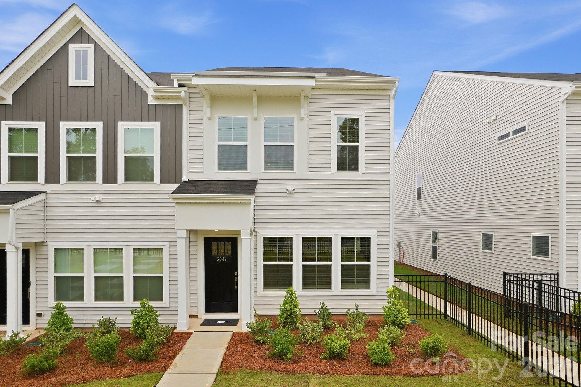 Welcome to Sloan Station, where modern new construction townhome living meets everyday Charlotte convenience. Built by Mungo Homes, this end-unit Clover floorplan offers 3 bedrooms, 2.5 bathrooms, an open-concept main level, and a spacious one-car garage.

The main level features 9-foot ceilings, recessed lighting, luxury vinyl plank flooring, a pantry, mud room, and thoughtful storage throughout. The great room flows into the kitchen and eat-in dining area, creating an easy layout for daily living and entertaining. The kitchen includes a spacious island, quartz countertops, tile backsplash, pendant lighting, ample cabinet space, and designer finishes.

Upstairs, the primary suite offers tray ceilings, a walk-in closet, double vanity sinks, quartz bathroom countertops, and a tiled shower. Two additional bedrooms, a full bathroom, and an upstairs laundry closet complete the second floor.

Enjoy quick access to Uptown Charlotte, I-85, Charlotte Douglas International Airport, South End, Wesley Heights, FreeMoreWest, the West Morehead corridor, the U.S. National Whitewater Center, and the Charlotte Regional Farmers Market. Additional features include HOA-maintained exterior upkeep, a community dog park, a 2-10 structural warranty, and 30-day and 11-month builder checkups.