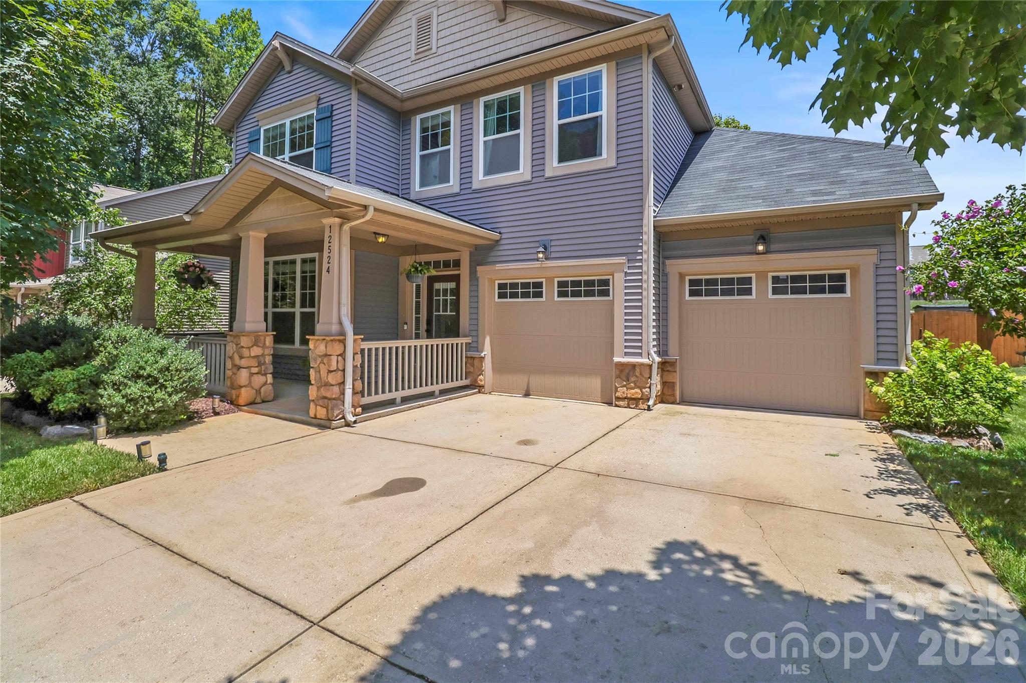 Welcome to your pristine, move-in-ready home tucked away on a quiet, low-traffic cul-de-sac lot. Boasting 3 bedrooms, 2.5 bathrooms, and an abundance of thoughtful upgrades, this home perfectly blends style, function, and storage. From the moment you arrive, the beautiful stone accent pillars and the cozy front porch welcome you inside. Once through the door, you’ll immediately notice the premium flooring—featuring new hardwoods on the stairs and Revwood flooring throughout.  Best of all? There is absolutely no carpet in this home! The formal living area features custom built-ins for your favorite books and decor, while the spacious great room invites you to unwind by the cozy gas fireplace. A generously sized dining room is perfect for family gatherings and holiday meals.  Beautifully updated and designed to be the heart of the home, the kitchen features premium quartzite countertops, a large island, a gas range, and a sun-drenched breakfast room surrounded by tons of windows. Head upstairs to find 3 bedrooms and a versatile loft area complete with custom built-ins—the perfect spot for a home office, homework station, or reading nook. The spacious primary bedroom serves as a true sanctuary, complete with elegant trey ceilings and the ultimate convenience of his-and-her closets. The primary bathroom has elegant countertops, a separate tub and shower, and tiled flooring. Two additional spacious bedrooms and a full bath provide plenty of space for family or guests. Doing chores is a breeze in the beautifully designed laundry room, packed with extra cabinet storage. You will never run out of room thanks to an abundance of closet storage throughout the entire home, plus a highly convenient drop zone for shoes, bags, and coats. Step outside into your fenced and private backyard, an ideal setup for weekend BBQs, pets, or just relaxing in your own secluded haven. For the hobbyist, DIYer, or car enthusiast, the garage is a standout feature. It comes equipped with professionally finished epoxy floors and tons of workbench and storage space to keep everything meticulously organized. Don't miss out on this cul-de-sac gem! Schedule your tour today to experience the perfect mix of modern upgrades and timeless comfort.