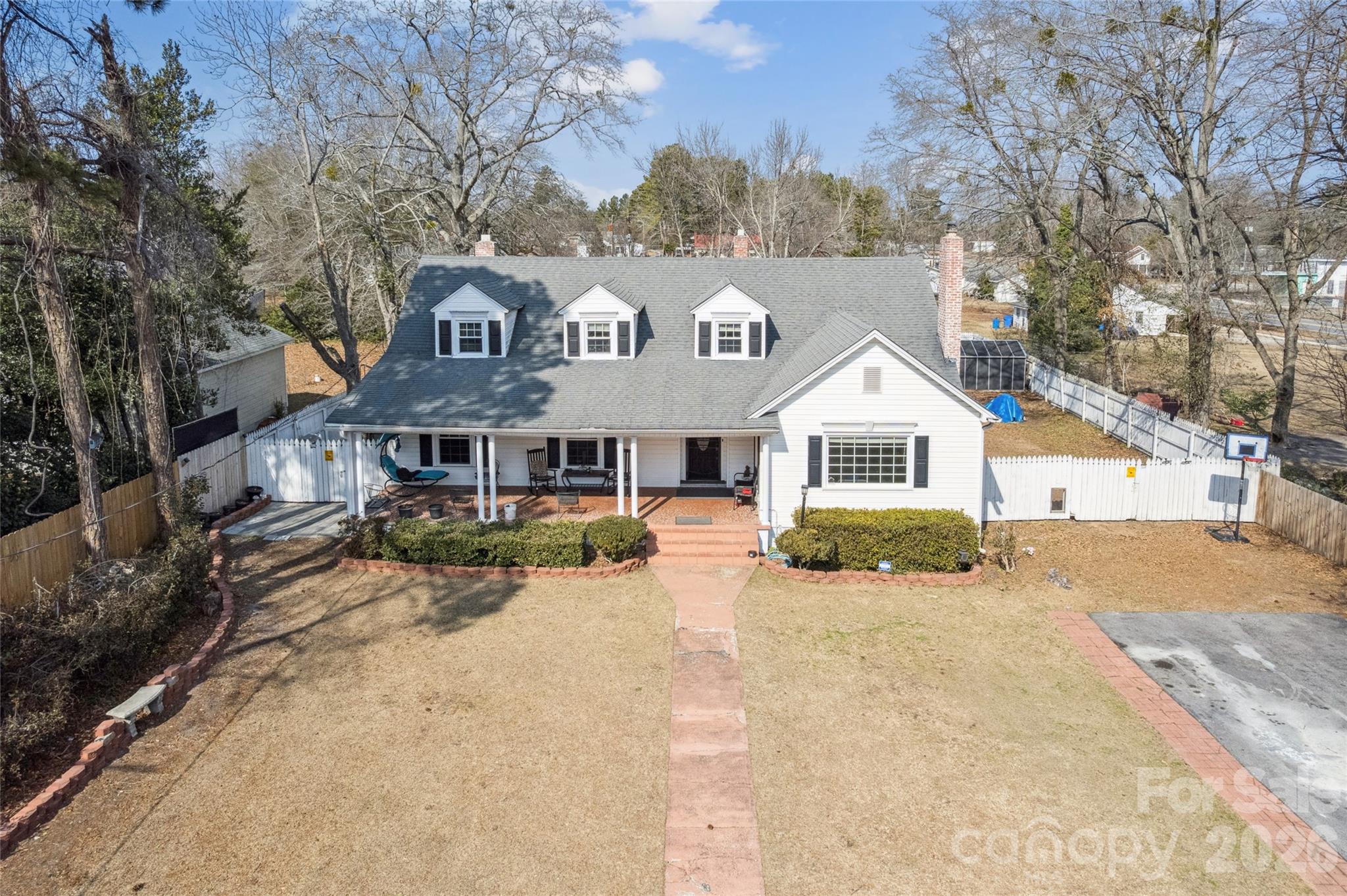 Nestled in the heart of historic downtown Pageland, this charming 1947 brick home offers the perfect blend of small-town character and everyday convenience. This residence features classic details, gorgeous fireplace, spacious rooms, and a functional layout ready for you to add your personal touch.

Highly conveniently located, this home offers easy access to Hwy 601 and a quick commute to Charlotte (approx. 45 minutes), Monroe, and surrounding areas. Whether you're looking for peaceful small-town living or a smart investment with strong commuter appeal, this property checks all the boxes.

Perfectly situated in the Historic Downtown Pageland district, just a short walk from charming local shops, restaurants, Polly’s Coffee & Ice Cream, and the beautifully restored Ball Theatre. Enjoy the true small-town atmosphere and rich history of Pageland.