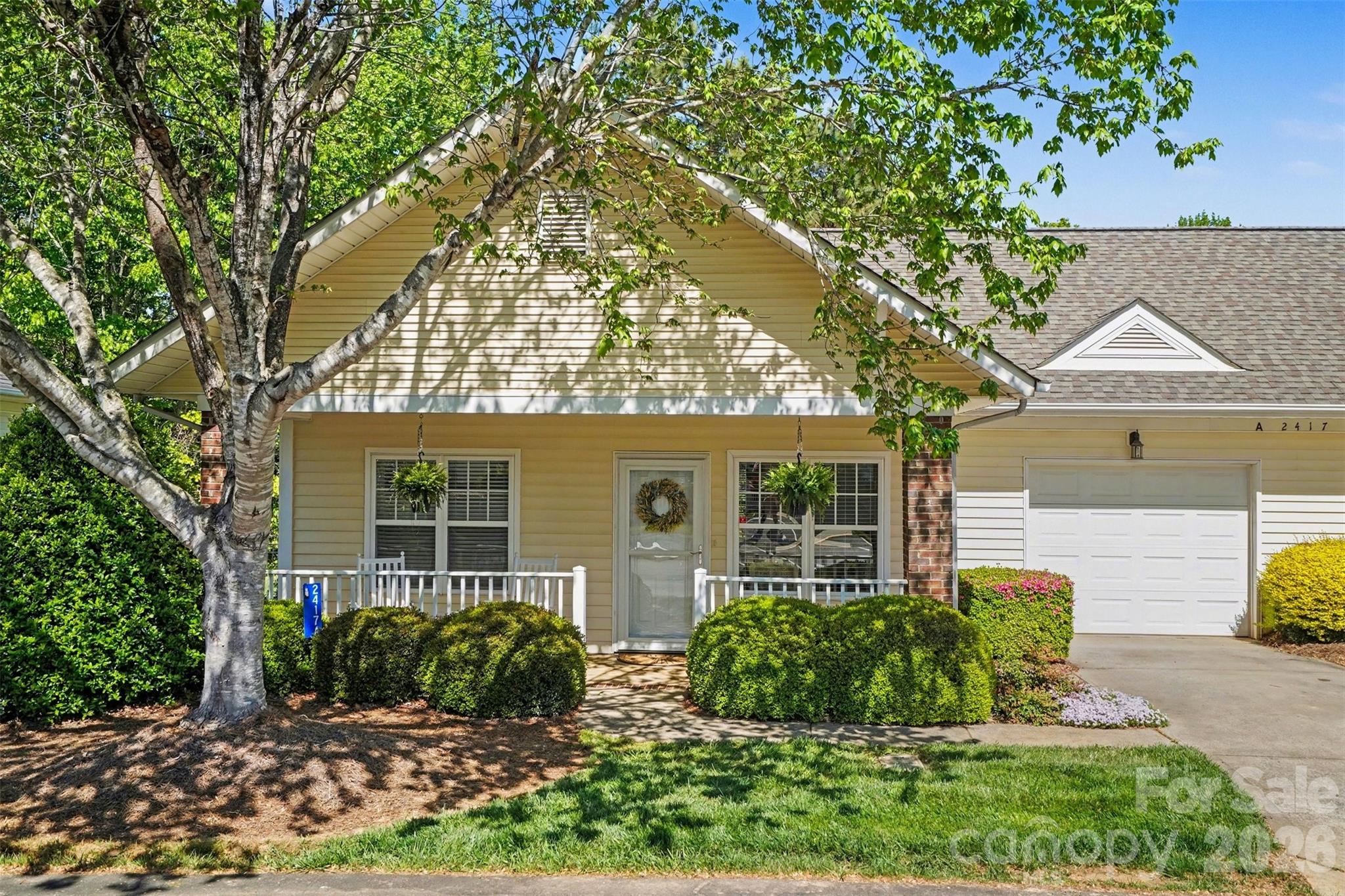 *MOTIVATED SELLER!* This is the home you've been waiting for! A dreamy bungalow perfectly situated with pond views from the screened back porch where you can enjoy your favorite beverage while watching the birds dance in the morning mist or capture the evening sunset views. Creating a community sense, you'll feel welcomed right away as you step onto the charming rocking chair front porch where you can sip your coffee and say hello to neighbors. Then enter the home to be greeted by the bright and airy living room with a cozy fireplace. This home is truly move-in ready, with fresh paint throughout and new living room carpet, plus newer carpeting in the remainder of the home (2021). The kitchen features updated LG appliances and beautiful wood cabinetry with plenty of storage, while the bathroom has been refreshed with new shower doors, showerhead, sink faucet, and mirror. An additional feature of this home is the large Family Room/Den, perfect for hobbies, crafts, movie nights, hosting friends, or simply creating a comfortable spot to unwind.

Just across the lane, the community clubhouse makes it easy to stay social and active, with spaces for dining, games, reading, and gatherings. There are frequent activities including coffee meetups, crafts, fitness classes, and more—something for everyone to enjoy. The HOA includes exterior maintenance, landscaping, roof, and Spectrum basic TV service.

All of this, just minutes from shopping, dining, and entertainment. It’s a home that’s as comfortable as it is convenient! **Motivated Seller**