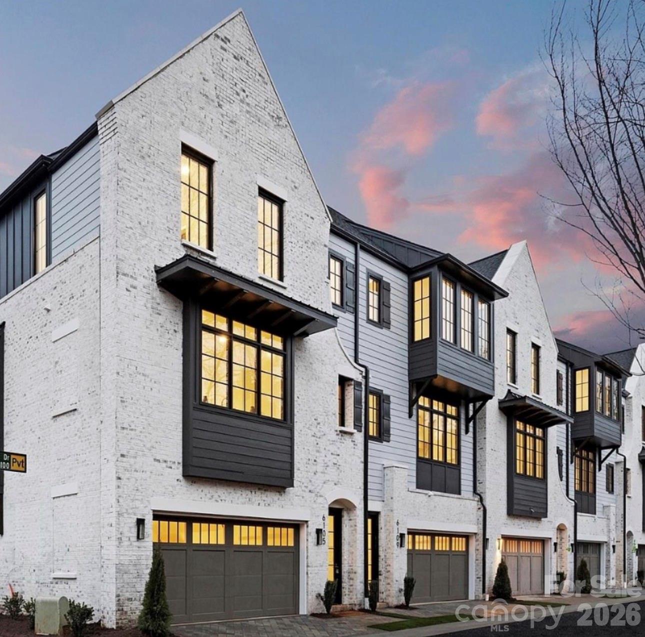 Luxury meets location in this exceptional end-unit townhome in the heart of SouthPark, one of Charlotte's most prestigious and highly sought after neighborhoods. As the original model home, this residence features many of the builder's finest upgrades and designer selections, making it one of the most distinctive homes in the community. This desirable end-unit location fills the main level living area with an abundance of natural light, creating a bright and inviting atmosphere. One of only 16 exclusive residences, this modern Tudor seamlessly blends timeless architecture and contemporary luxury. 

The chef's kitchen is equipped with premium appliances, including a paneled refrigerator/freezer, Wolf gas range, wine refrigerator, and custom cabinetry that provides plenty of storage. The open concept floor plan is ideal for entertaining while offering sophistication and comfort. A stunning private office, enclosed with custom sliding barn doors, provides an inspiring and functional workspace, perfect for today's work from home lifestyle or just a quiet retreat. Enjoy outdoor living with a private courtyard and balcony, perfect for morning coffee, or simply relaxing after a long day. Just minutes from SouthPark's premier shopping, fine dining, entertainment, and parks, this exceptional home offers an unmatched blend of luxury, convenience, and lifestyle.