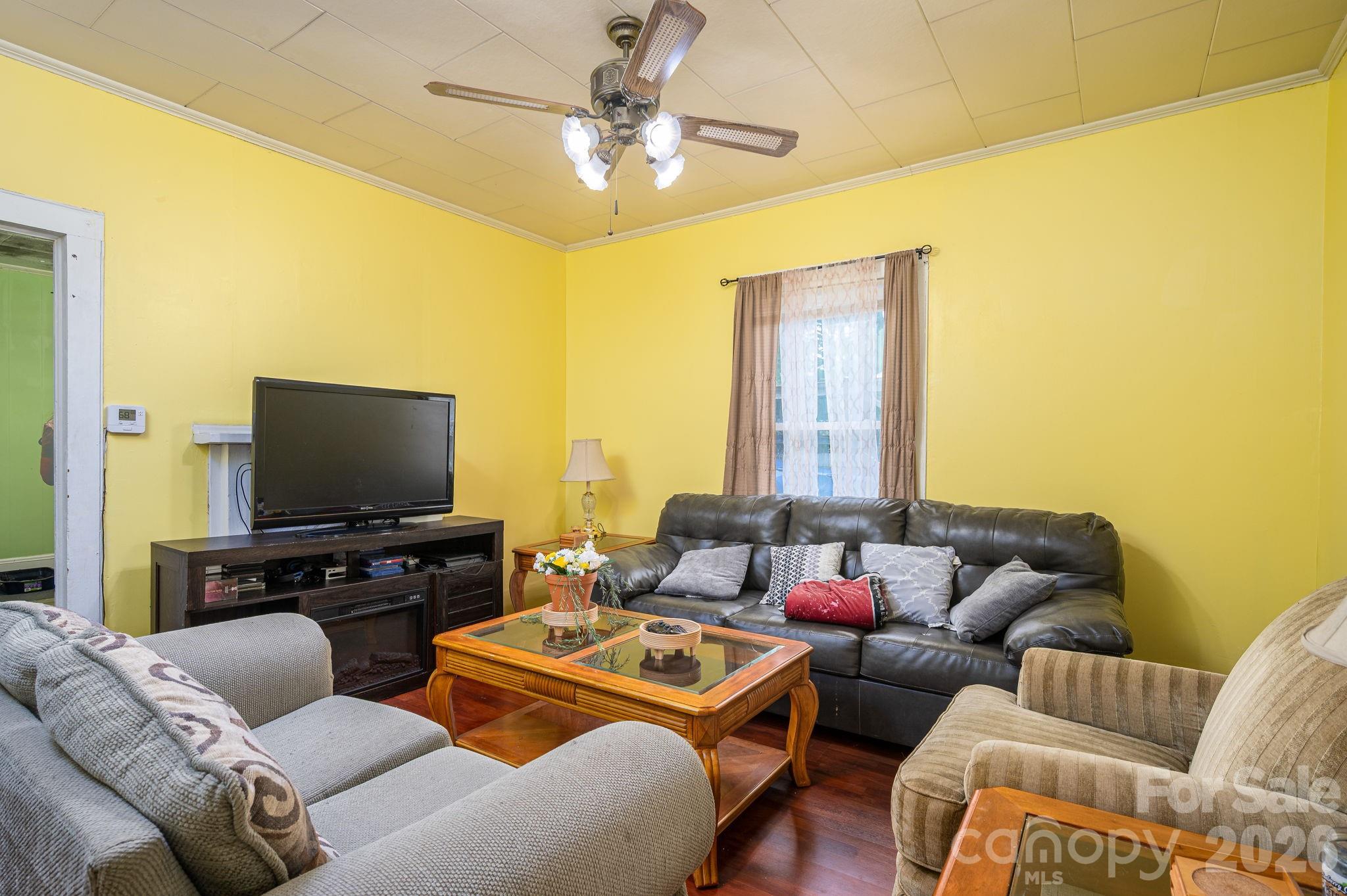 MOTIVATED SELLER!  Offering $5000 credit towards any type of remodeling or repairs the buyer wants to do with a acceptable offer OR could use for RATE BUY DOWN!  Welcome to the quaint town of Cherryville!  If you love those old house vibes you are going to love this one!  This 3 bed, 1 1/2 bath welcomes a little bit of TLC to bring it up to its true potential.  The great news is some of the old house character remains and has been preserved.  Many updates have already been completed such as a new HVAC in 2023, new water heater 2023 and new plumbing 2023.  All but two windows have been replaced at some point as well.  Original hardwoods shine throughout this home with tile in the kitchen and then linoleum in the dining room.  Tall ceilings and plenty of windows make the space feel bright and spacious.  Off street parking available with a shared driveway (agreement in place).  The 2 sheds convey although one probably needs to be torn down, the other is usable.  If you are looking for a home with some sweat equity potential, this one is a great fit!  

Appliances do not convey.