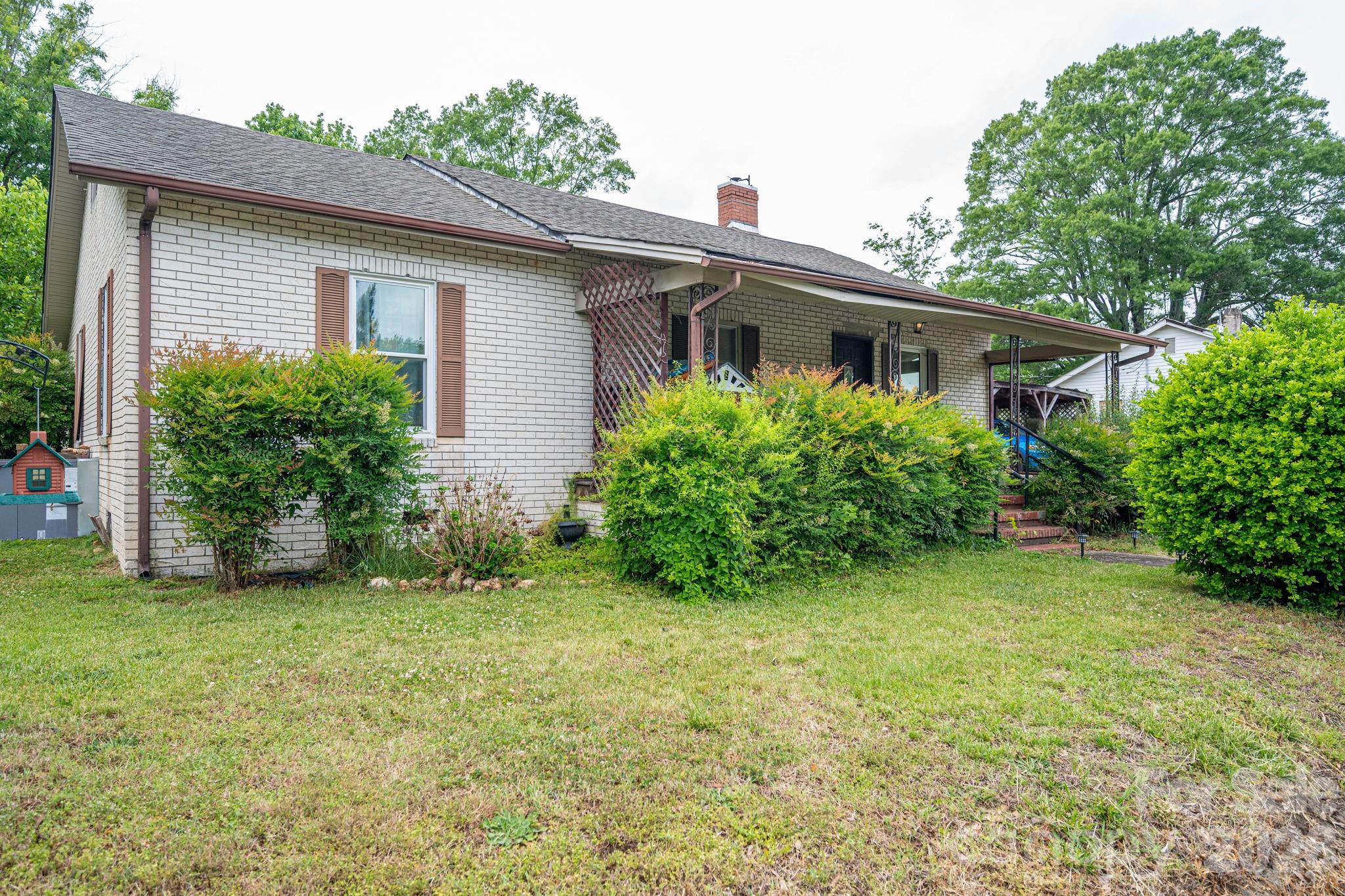 Welcome to the quaint town of Cherryville!  If you love those old house vibes you are going to love this one!  This 3 bed, 1 1/2 bath welcomes a little bit of TLC to bring it up to its true potential.  The great news is some of the old house character remains and has been preserved.  Many updates have already been completed such as a new HVAC in 2023, new water heater 2023 and new plumbing 2023.  All but two windows have been replaced at some point as well.  Original hardwoods shine throughout this home with tile in the kitchen and then linoleum in the dining room.  Tall ceilings and plenty of windows make the space feel bright and spacious.  Off street parking available with a shared driveway (agreement in place).  The 2 sheds convey although one probably needs to be torn down, the other is usable.  If you are looking for a home with some sweat equity potential, this one is a great fit!  

Appliances do not convey.