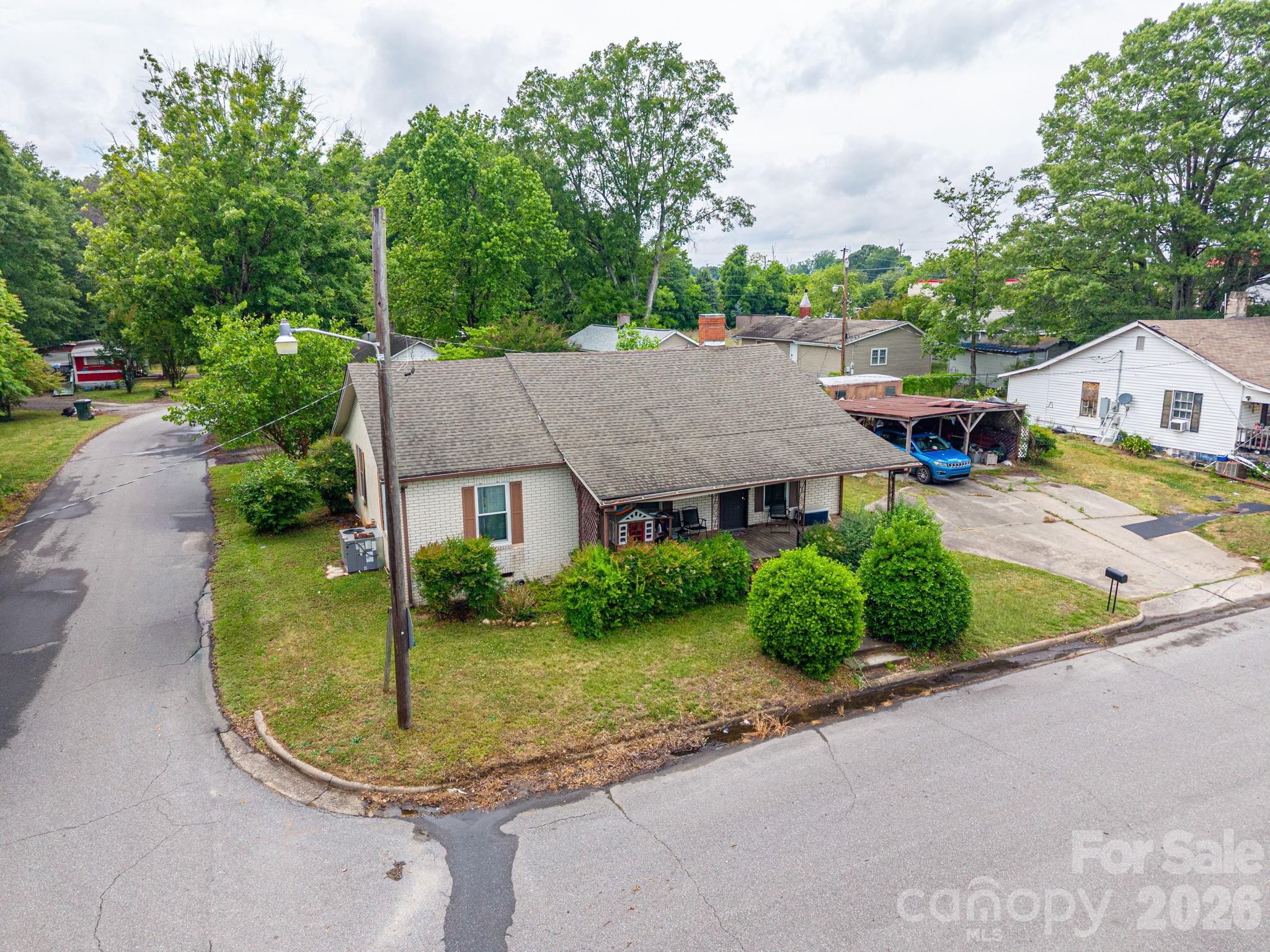 Welcome to the quaint town of Cherryville!  If you love those old house vibes you are going to love this one!  This 3 bed, 1 1/2 bath welcomes a little bit of TLC to bring it up to its true potential.  The great news is some of the old house character remains and has been preserved.  Many updates have already been completed such as a new HVAC in 2023, new water heater 2023 and new plumbing 2023.  All but two windows have been replaced at some point as well.  Original hardwoods shine throughout this home with tile in the kitchen and then linoleum in the dining room.  Tall ceilings and plenty of windows make the space feel bright and spacious.  Off street parking available with a shared driveway (agreement in place).  The 2 sheds convey although one probably needs to be torn down, the other is usable.  If you are looking for a home with some sweat equity potential, this one is a great fit!  

Appliances do not convey.