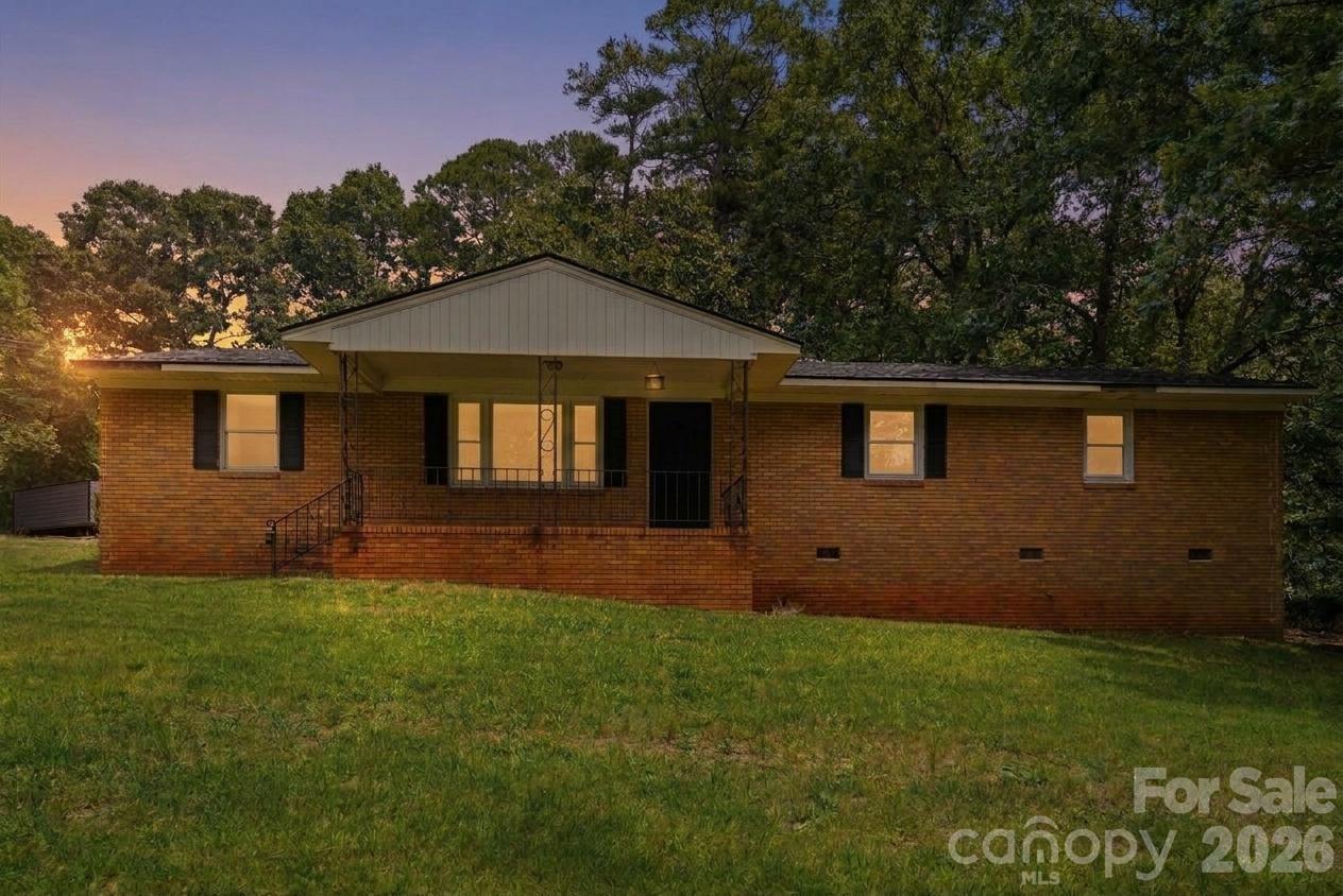 LOWEST-PRICED 3 bed/2 bath in Belmont AND includes two parcels for a total of .82 acres! Discover the potential in this 3-bedroom, 2-bath ranch nestled at the end of a quiet dead-end street in a private, peaceful setting. Situated on two parcels, this property offers plenty of space to enjoy, expand, or simply relax with added privacy. Inside, you'll find a functional layout with hardwood flooring, ready for your personal touch. With optional future cosmetic updates, it provides a great opportunity to add your own style and build equity. Whether you're a first-time buyer, investor, or someone looking for a home with room to make it your own, this property is full of possibilities. Don't miss your chance to transform this hidden gem into your dream home! Only 10 minutes to popular downtown Belmont and 20 minutes to Charlotte airport. Showings start this Saturday, 7/18 but schedule now!