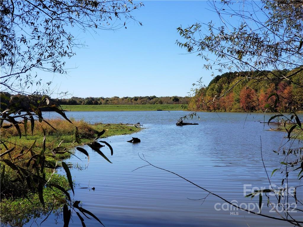 26 +/- acres of a unique sportsman's paradise along Gills Creek outside of Lancaster S.C. near highway 9. This floodplain property has everything a hunter or fisherman wants, abundant wildlife, great fishing and roughly 13 acres of a community lake with 13 +/- acres of floodplain land to call your own. The property will not support a conventional septic system and is not considered suitable for residential building. This property is perfect for deer and duck hunting or launching your own canoe, kayak or john boat for fishing or just taking nature walks. The land is part of a pristine 50 +/- acre lake along Gills Creek. Access to the property is via a deeded 50-foot-wide access strip coming from Deer Track Circle between 2519 & 2567 Deer Track Circle. The deed states it includes the community boat landing, the "Lake", Gills Creek and all other areas not contained in lots number One through 45 inclusive. Title insurance can be issued with the landing area being non-exclusive use.