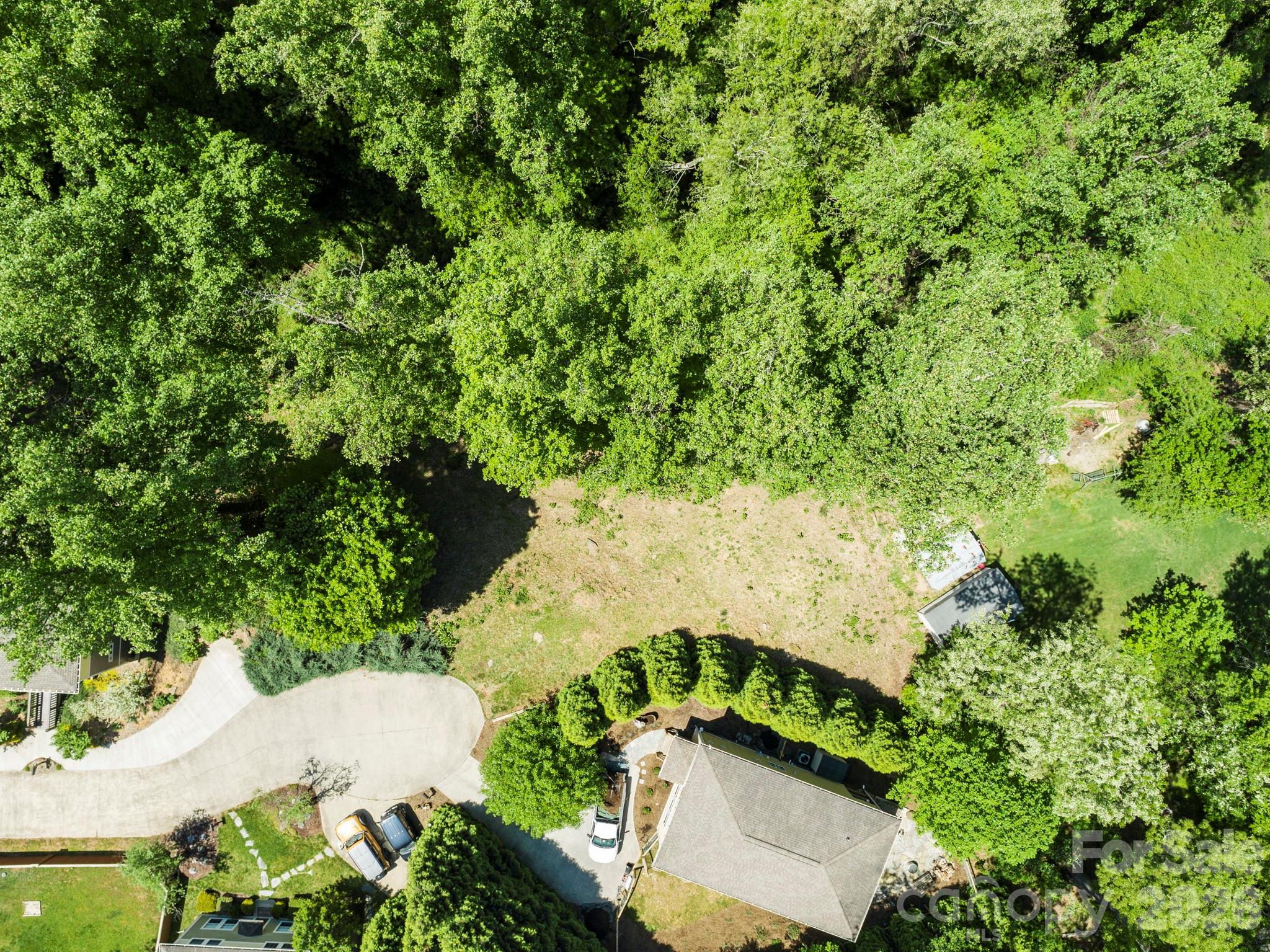 Basement ready lot is cleared with sewer and water taps installed, all utilities in place, saving major time and money! Perfect opportunity to build in Hot EastWest Asheville with winter views of Downtown. Riverlink Lane is ideally located between Haywood Rd and the River Arts District minutes to restaurants, breweries, shops, greenways, and the French Broad River. Thinking about building but don't know where to start? Call listing agent for details.