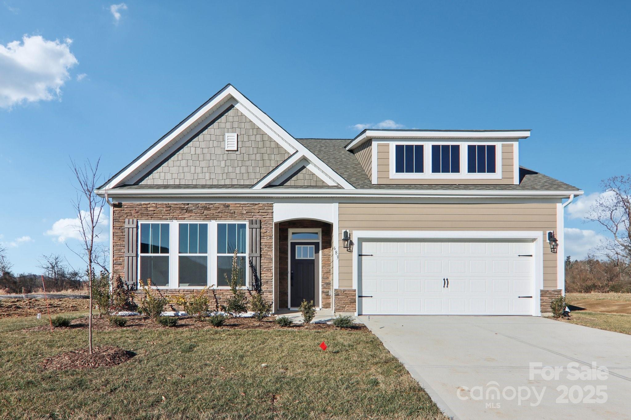 Tap Root Farms is a master planned community in Fletcher, NC. Community features include a 5,000 square foot resort style clubhouse with gym, extra-large swimming pool, playground, 6 pickle ball courts and dog park. Minutes to Downtown Fletcher and easy access to I-26 for commuting. The Azalea features an open floor plan with soaring 10' ceilings on the first floor creating a spacious and inviting atmosphere. This home features 4 bedrooms and 3 bathrooms, as well as a two-car garage. The moment you step inside the home, you will be greeted by an inviting foyer that leads you into the center of the home. The dining room seamlessly connects with the family room and kitchen, providing space for you to grow. The chef's kitchen has modern stainless-steel appliances featuring a natural gas range, a pantry closet, and a 13' long breakfast bar/island. The primary suite offers an en-suite bathroom with dual vanities and a walk-in closet. An upstairs loft offers additional space for home office, theater, playroom or more! The back of the home offers a screened porch for plenty of outdoor time and fresh air. *Home features are subject to change without notice. Internet service not included. Sq footages are approximate*