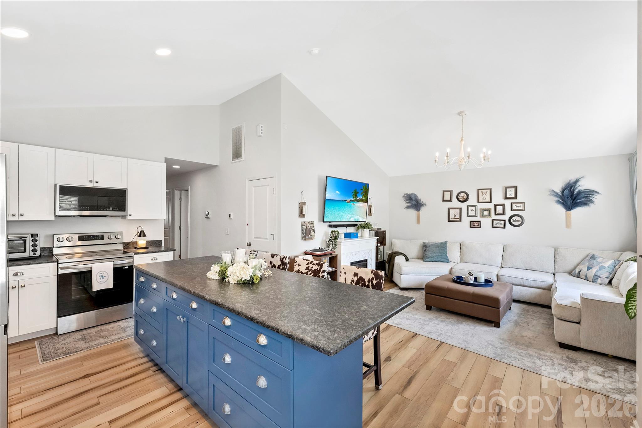 Built in 2023, this four-bedroom home offers something becoming increasingly difficult to find in Charlotte: newer construction under $400,000 just minutes from Uptown. No HOA, modern systems, low-maintenance ownership, and a compelling alternative for buyers looking to stop renting and start building equity.

The open-concept floorplan features elevated ceiling heights and a vaulted living area that makes the home feel bright, spacious, and connected. The kitchen was designed for everyday living and entertaining alike with granite countertops, custom cabinetry, an oversized center island, recessed LED lighting, and modern finishes throughout.

The primary suite offers a private retreat with ensuite bath and walk-in closet, while the fourth bedroom creates the perfect flex space for a home office, guest room, workout room, or creative studio.

Outside, the seller added a standout backyard entertaining space with a large standalone deck, privacy fencing, and room to gather, relax, or play.

Located minutes from Uptown Charlotte, the home sits in an area experiencing continued investment, new residential development, and ongoing growth throughout Charlotte's west side. For buyers seeking newer construction without the price tag often found in more established neighborhoods, it's a compelling alternative worth considering.

Easy access to Uptown, major highways, dining, breweries, and everything happening across Charlotte's evolving west side.