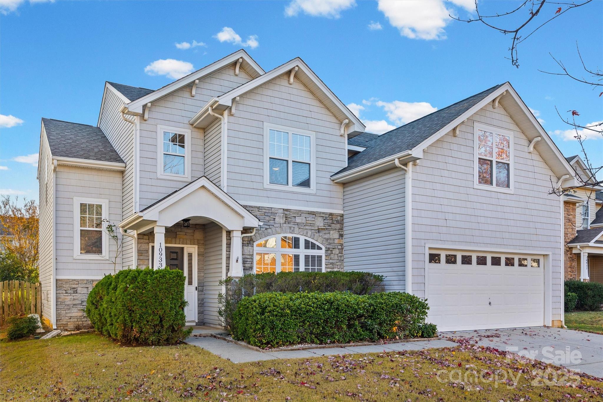 This is your move-in ready, home-for-the-holidays, dream come true in the heart of Ballanyne! Bright & beautifully maintained home with fresh paint, LVP flooring on main & new carpet upstairs.  The open floor plan is perfect for entertaining as well as everyday living. Warm kitchen cabinetry, GE Profile stainless appliances, dedicated pantry & breakfast nook make the kitchen a great place to hangout and cook. Enjoy the spacious family room with a cozy gas fireplace as well as a sun room ideal for a playroom, home office, craft space—you name it! Relax in the primary suite complete with tray ceiling, garden tub, walk-in shower & dual sinks. The huge bonus room w/closet provides space for everyone to spread out. Convenient upstairs laundry (washer & dryer stay)! Fenced back yard with extended patio to enjoy the outdoors and a community pool & playground too. All of this and just steps from everything Ballantyne – walk to top rated schools and only minutes away from The Bowl, Blakeney & Rea Farms shopping and dining. All of the boxes are checked with this one—just unpack and relax!