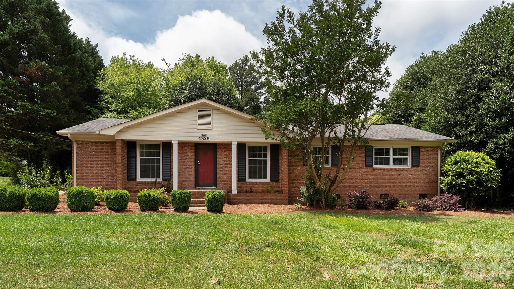 Beautiful Partial Brick home, Well Maintained Ranch Home nestled among trees in a quaint neighborhood w/ No HOA. Featuring 3 bedrooms & 2 bathrooms, this home boasts recent upgrades including Fresh Paint, New Flooring, New carpet and much more. Beautiful Charlotte home with no HOA—the kind of freedom buyers are always hunting for and rarely find. Whether you're a first-time buyer, downsizing, or adding a solid investment to your portfolio, this property checks every box. Pull into your extended driveway and step into a home that balances comfort and practicality effortlessly. Situated on .61Acre in Mint Hill, with easy access to shopping, grocery, restaurants, medical, and Hwy. 74 & 485.
