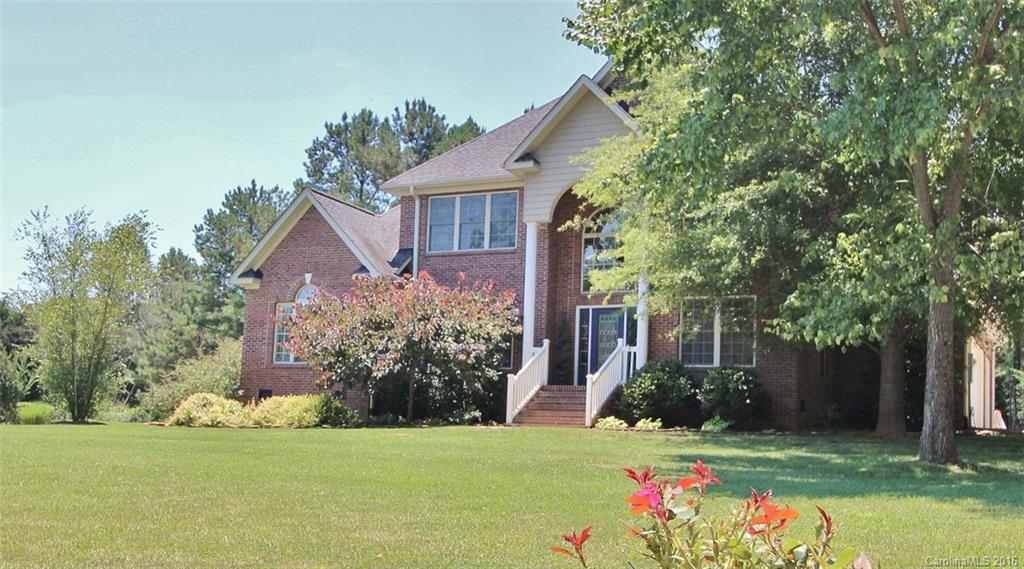 Discover Clover’s prominent Patrick Place neighborhood and beautiful park!  Excellent floorplan w/ hardwoods  throughout the first floor, including Master and 2nd bedroom! Open plan features high ceilings, abundant kitchen cabinets with the “silent butler”, custom built-ins, extensive trim work, a screened in porch for warm summer days and a stone patio with a firepit for the cool winter nights.