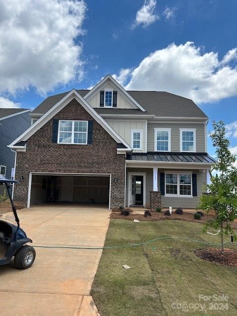 The Davidson plan in the Elizabeth neighborhood boasts spacious open living spaces with three floors. The kitchen pantry is massive and the owner's suite is very roomy. The third floor has a fifth bedroom with a full bathroom and game room. Upcoming amenities will include a 2-story clubhouse, pool, fitness center, pickle ball courts, multi-use courts, walking trails, parks, and more. Centrally located, Elizabeth is just minutes from shopping, dining, downtown Fort Mill, and I-77. Come experience lifestyle and charm in the heart of it all!