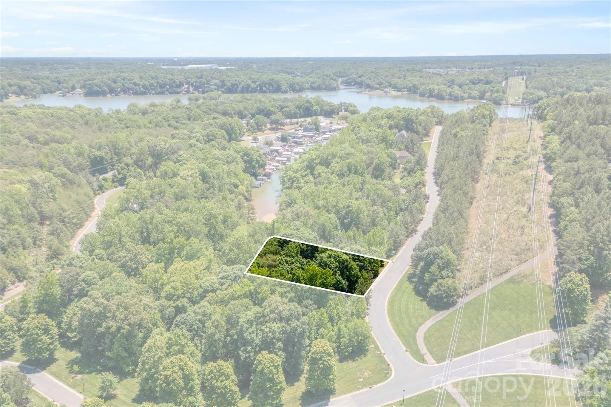 Nestled in the highly sought-after Reflection Pointe community, this beautiful 0.32-acre waterfront lot offers the perfect opportunity to build your dream home. Situated on a peaceful street, 2009 Beauhaven Lane backs up to the water, providing serene views and a private setting. Enjoy all that this premier gated neighborhood has to offer, including resort-style amenities, walking trails, clubhouse, pool, tennis courts, and lake access. Bring your own builder and create the custom home you’ve always envisioned in one of Belmont’s most desirable communities. Conveniently located near downtown Belmont, dining, shopping, and a short drive to Charlotte.