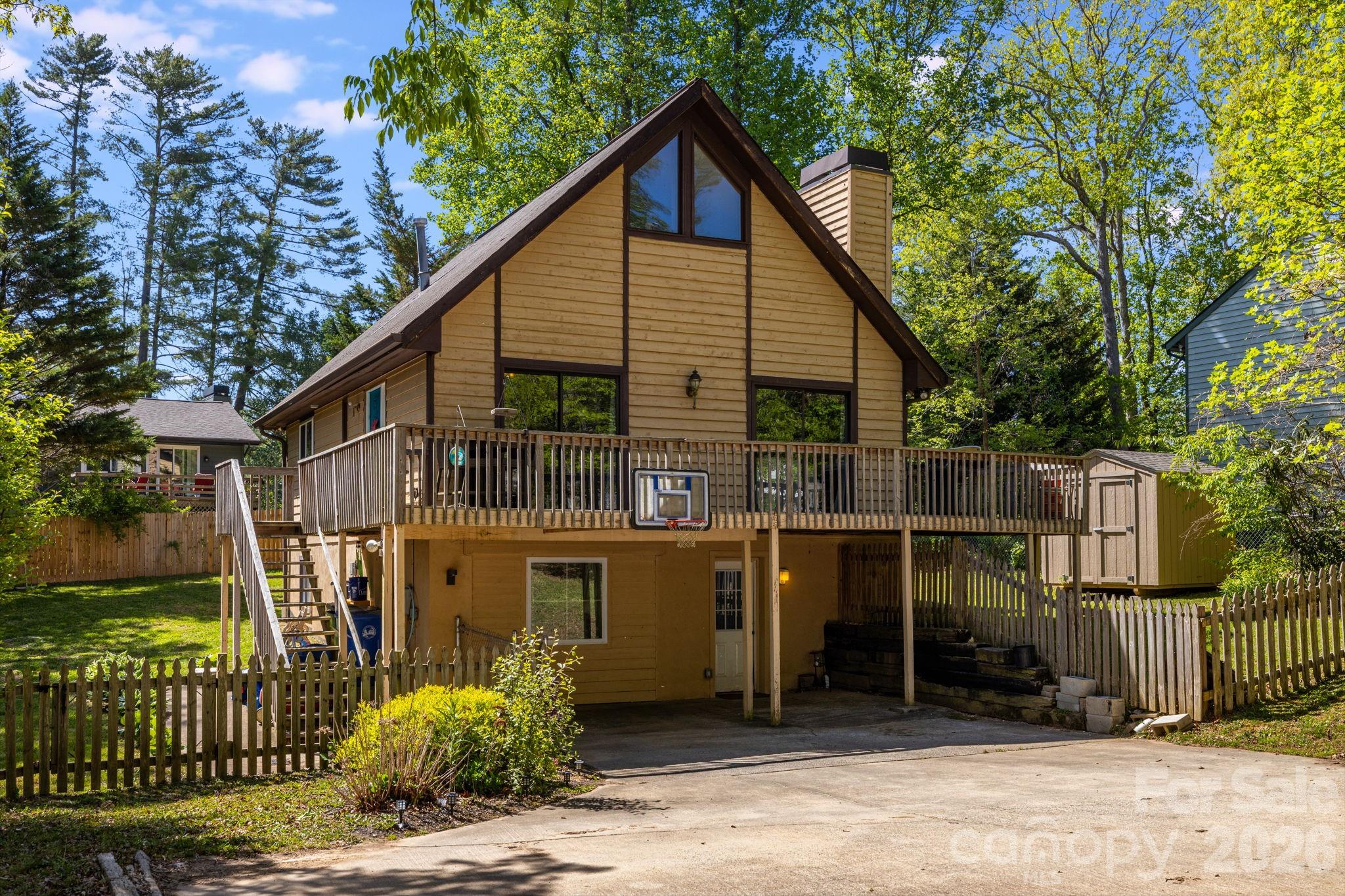 Welcome home to Fletcher! This inviting property is ideally located just minutes from shopping, dining, and the airport, making everyday living both easy and convenient.

The main level features a beautifully renovated kitchen with stainless steel appliances, a cozy gas log fireplace with a stunning stone surround, vaulted ceilings in the living room, and a spacious deck—perfect for grilling out or entertaining friends and family. Additionally, there is one bedroom and a centrally located full bathroom. Upstairs, you’ll find a generous primary suite complete with a full bath and walk-in closet. The lower level offers one additional bedroom and two versatile bonus rooms, providing endless possibilities for guests, a home office, or recreation space.

In addition to the updated kitchen, the furnace and hot water heater were both replaced in 2021. Outside, the large, fenced yard is ideal for pets, play, or simply enjoying the outdoors.

A comfortable home in a fantastic location—come see it for yourself!
