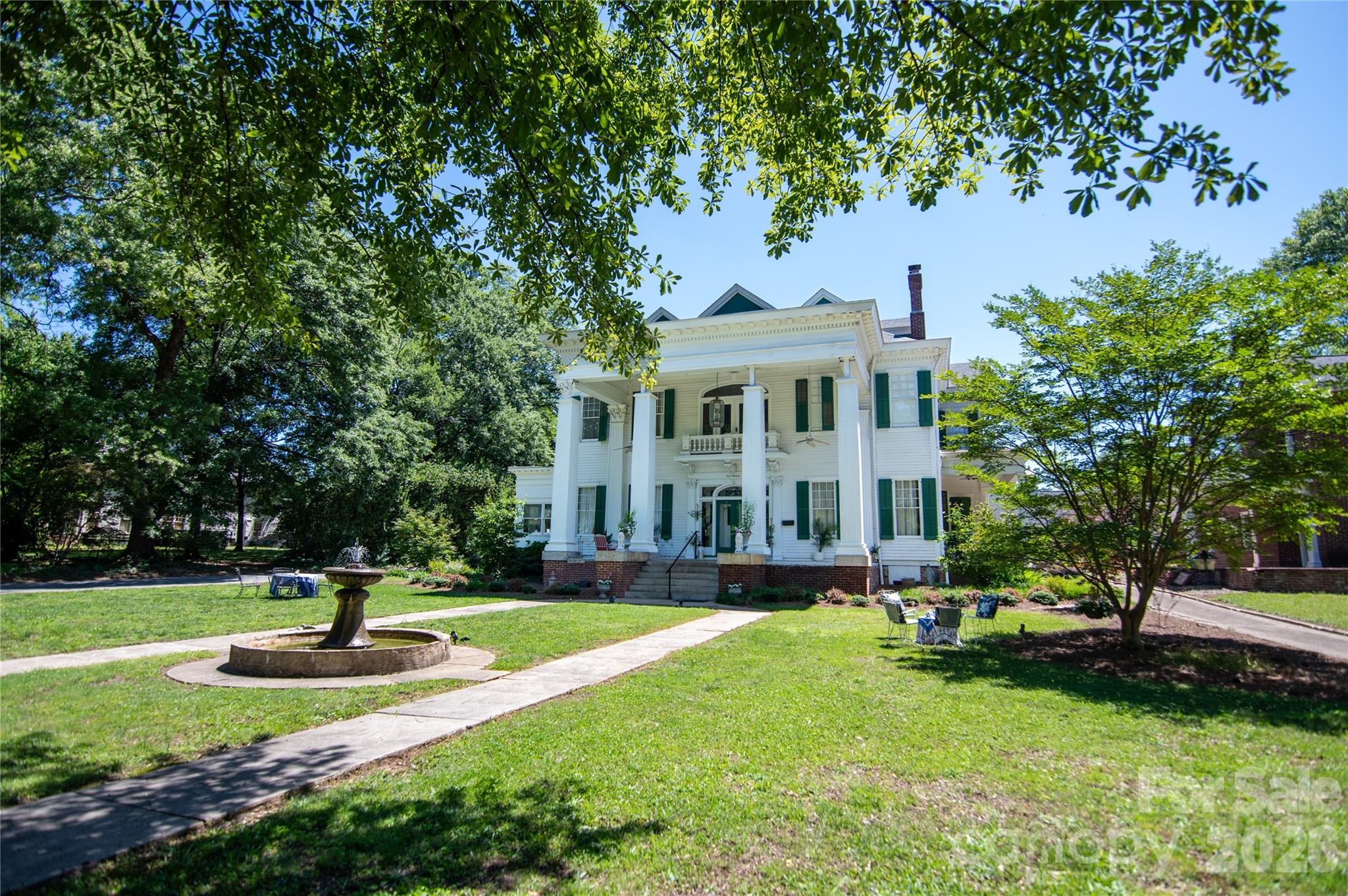 SS Royster House – A Rare Opportunity to Own a Piece of Shelby History

Step back in time and experience the grandeur of the SS Royster House, an impressive 1909 Colonial Revival residence that stands as one of Shelby's distinguished historic homes. Offering more than 5,000 square feet of living space, this remarkable property showcases the timeless craftsmanship, architectural character, and generous room sizes that define a bygone era.

Lovingly cared for by its current stewards, the home has undergone significant updates in recent years, blending modern comfort with historic charm. Improvements include renovated kitchens and bathrooms, updated HVAC systems, and electrical enhancements, allowing the next owner to enjoy the best of both worlds—historic elegance and contemporary convenience.

From its stately presence and expansive rooms to its rich history and enduring character, the SS Royster House offers endless possibilities. Whether envisioned as a grand private residence, a multi-generational home, or a charming bed-and-breakfast, this property provides a unique opportunity to create a lasting legacy.

Ideally located within walking distance of downtown Shelby, you'll enjoy easy access to some of the area's most beloved destinations, including the Cleveland County Arts Council, the Earl Scruggs Center, and the Don Gibson Theatre. Stroll downtown to discover local restaurants, breweries, boutiques, coffee shops, entertainment, and community events that make Shelby such a vibrant place to call home.

Become the next steward of the SS Royster House and write the next chapter in the story of this extraordinary historic property.