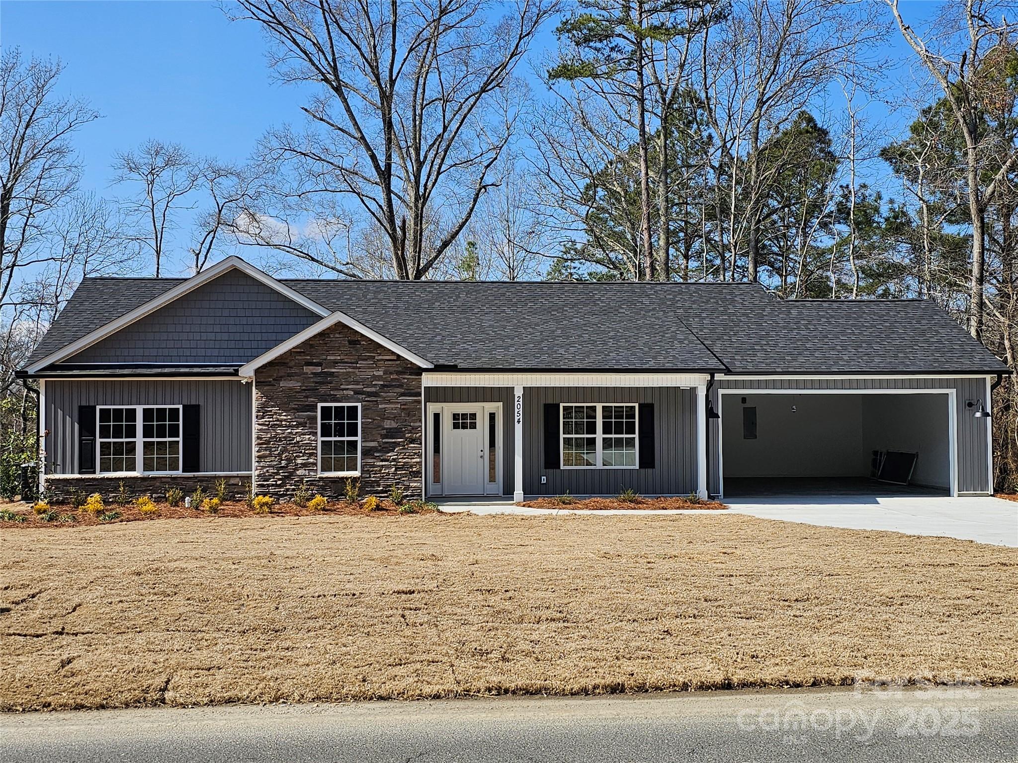 Back on the market at no fault of the seller.

Come enjoy this new construction home.  Features 9ft ceilings. Rear screen porch. 2 car garage.  Large living room.
The kitchen has a large amount of cabinets, counter space also with an island and a pantry. Primary bedroom has a walk in closet. Lots of closets in this home for great storage.