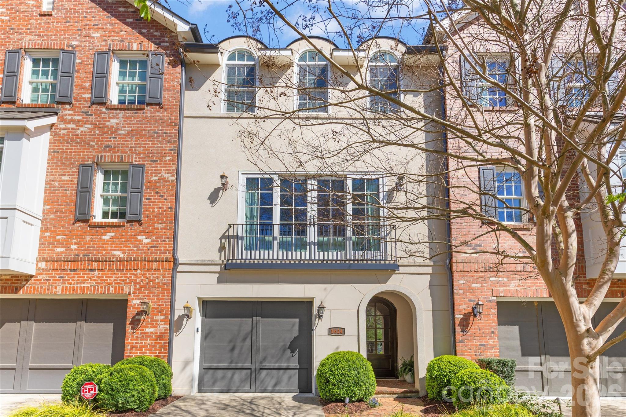 Welcome to this beautiful TURNKEY townhome in desirable Dilworth neighborhood, and enjoy NO HOA FEES. Ideally located just steps from Freedom Park, this home offers incredible walkability to many restaurants, shops, and amenities. Built by Simonini Builders in 2016, this exclusive nine townhome community offers a rare blend of privacy, luxury, and LOW-MAINTENANCE living. This is only 1 of 3 units with a private ELEVATOR providing effortless access across all levels. 
The home includes 2,366 square feet, 3 bedrooms, 3.5 bathrooms. The first floor features a versatile bedroom or office with a full bathroom, perfect for guests or a private workspace. The main level has an open floorplan filled with natural light. The chef's kitchen has high end appliances and oversized island, dining area open to private covered patio, and a spacious den with fireplace. Upstairs you'll find a second bedroom with ensuite bathroom and laundry closet. The stunning primary suite offers generous walk-in closets and a spa-like bathroom. This home has a security system with cameras on all exterior doors with a keyless garage entry with camera. Outside you'll enjoy two decks, and a LARGE FENCED BACKYARD great for pets, OVERLOOKING THE GREENWAY.