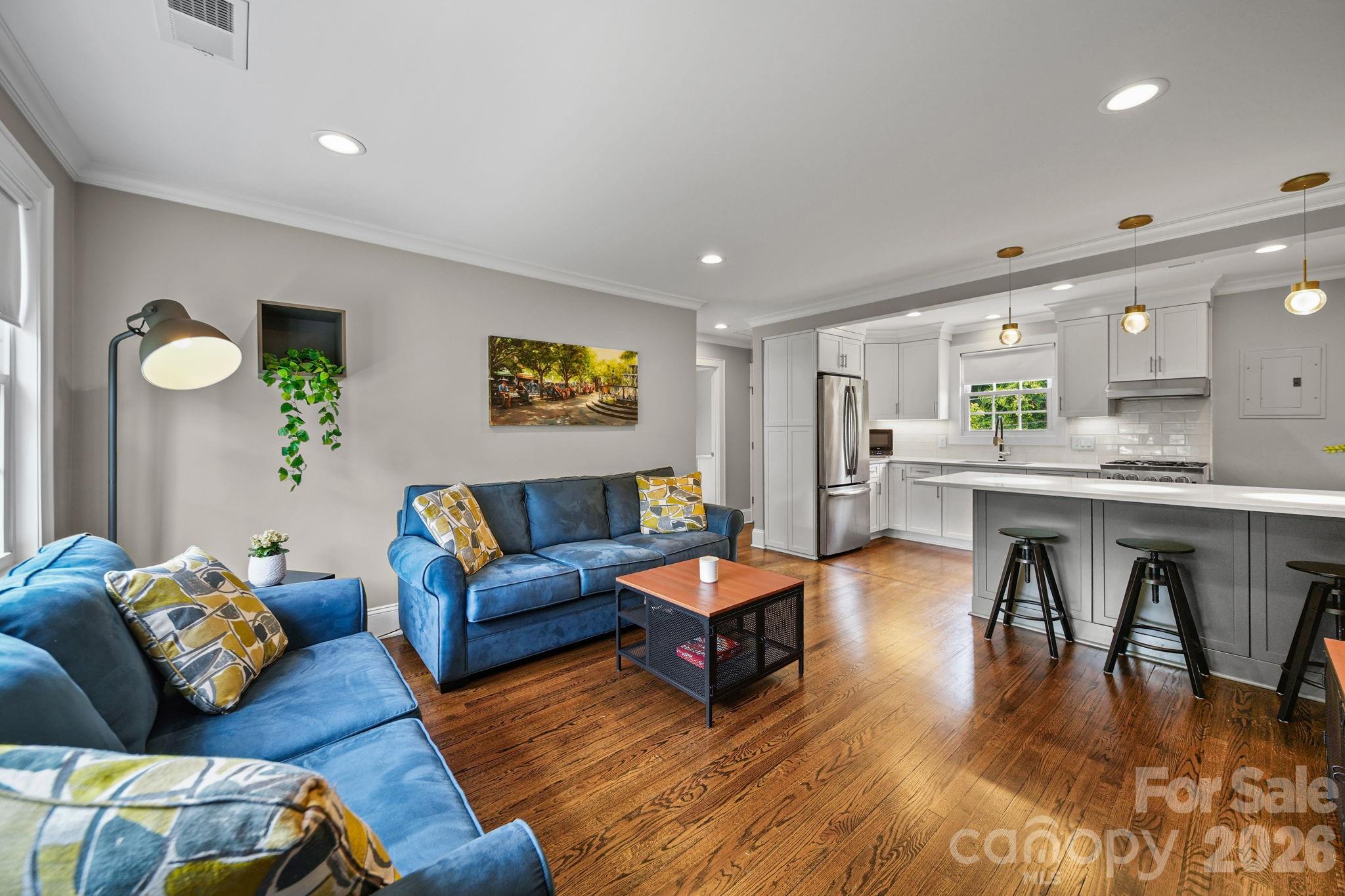 Gorgeous bright & sunny, completely updated modern top floor unit with the Little Sugar Creek Greenway access right at your back door! You'll love this open concept condo at Selwyn Village in Myers Park! Steps from all the restaurants and retail on Montford and at Park Road Shopping Center, makes this location prime for an easy lifestyle, convenient to everything. 
The renovation for this unit included removing walls to enlarge the kitchen & bath. Designer tiles and granite make this a fresh new looking space. Stainless steel refrigerator & commercial grade stainless steel gas stove plus a generous sized kitchen island are perfect for entertaining. Hardwood floors, & crown molding throughout. 
Ample parking for owners and guests. Quick access to SouthPark, Southend, and Uptown. Completely turn-key move in ready. Welcome home!