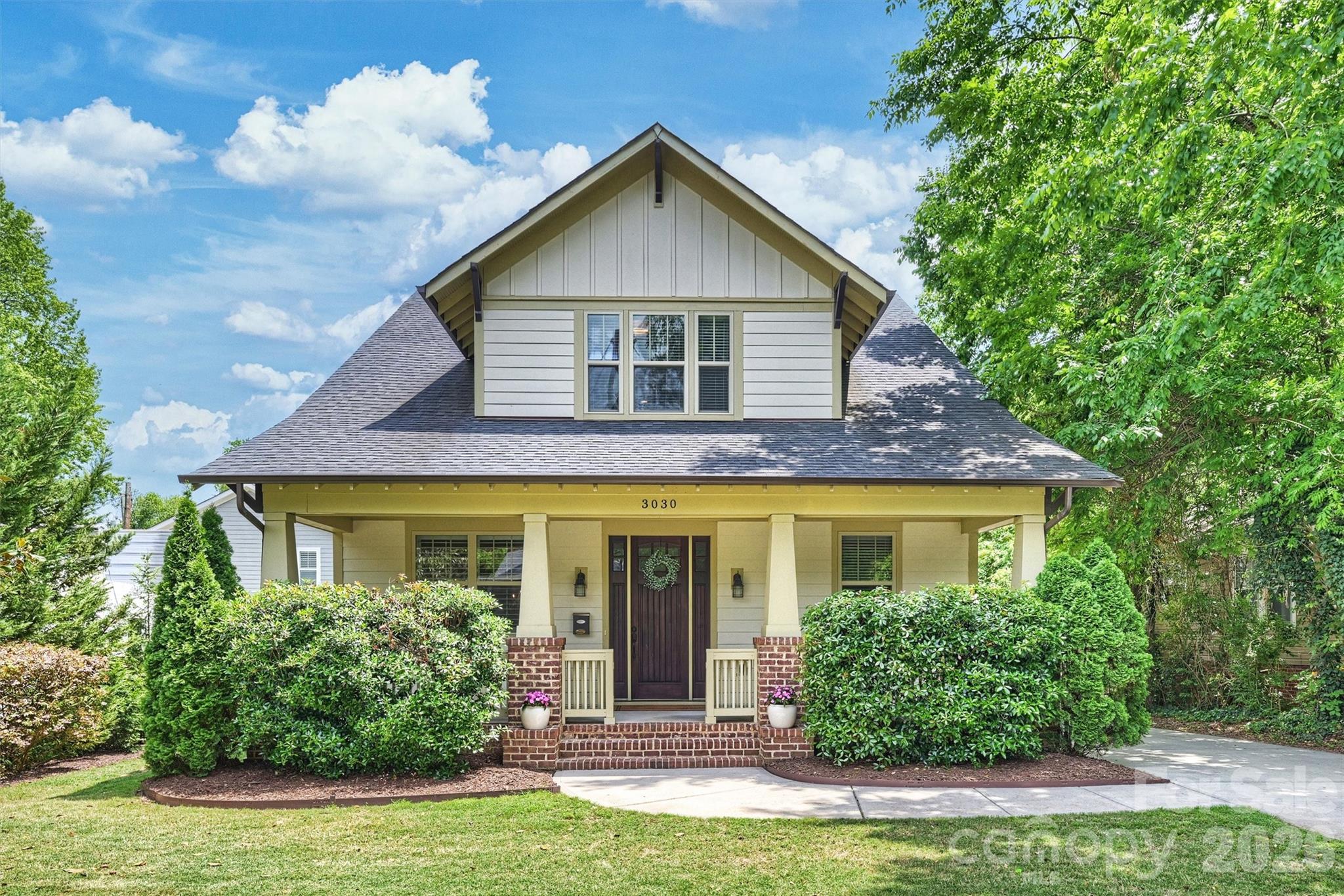 Welcome to this charming bungalow-style home in Plaza Midwood, thoughtfully designed with elevated finishes, a functional layout, and exceptional indoor-outdoor living. Built in 2017, this home blends modern convenience with timeless character, featuring tall ceilings, curved cased openings, and an open floor plan ideal for everyday living and entertaining. From the moment you arrive, the charming covered front porch sets the tone for this home, complete with a quaint fenced enclosure and gate— an ideal space for relaxing while keeping little ones or pets safely nearby. Upon entering, you’re welcomed by a formal living room complete with a fireplace and custom built-ins, creating a warm and inviting first impression. The main level offers a versatile home office or flex space, along with a guest bedroom and full en-suite bath, perfect for visitors! At the center of the home is the chef’s kitchen, showcasing a large stone island ideal for gathering, while seamlessly opening into the dining area and spacious family room. Upstairs, the expansive primary suite serves as a true retreat with two separate custom walk-in closets and a spa-like en-suite bath featuring a dual vanity and oversized shower. Two additional bedrooms are upstairs along with another full bath. All three bathrooms are generously sized and thoughtfully designed with dual vanities, delivering a level of comfort and functionality. Outdoor living is a standout feature with both covered front and back porches designed as a natural extension of the home's main living areas. The fully fenced, beautifully landscaped backyard offers an impressive amount of green space — a rare find in Plaza Midwood — providing endless opportunities for play, pets, gardening, or outdoor gatherings. Plenty of room to add a garage if desired - sellers have plans & willing to share upon request! Minutes from coffee shops, dining, breweries, shopping, and Midwood Park where so many fun neighborhood events take place! 

The white commercial building to the left has been re-zoned to residential & a SFH will be built. We have the elevation plans. Shamrock Drive will be undergoing a big improvement project to make it more pedestrian & bike friendly & slow traffic patterns down which will be a huge value add for the neighboring homes. https://www.charlottenc.gov/Growth-and-Development/Projects/CNIPCentral/Shamrock-Complete-Street