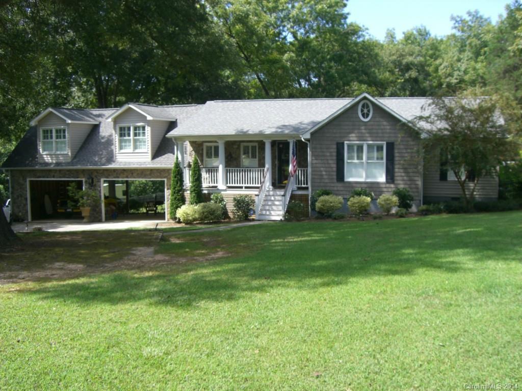 This home is like a  paradise, in-ground pool 14x28, hot tub, irrigation with separate well, new kitchen with Kraft made cabinets and granite counter tops. new stove, worming drawer, microwave. Home has plantation shutters on all windows. Central Vacuum system, gas logs . Back yard is fully fenced with mature trees, shady. Bonus room over carport could be 3rd bedroom if you added closet.Enjoy the sun room overlooking the pool. Home has 2 wells.  Guest house with kitchen, bath ,den, A/C & heat.